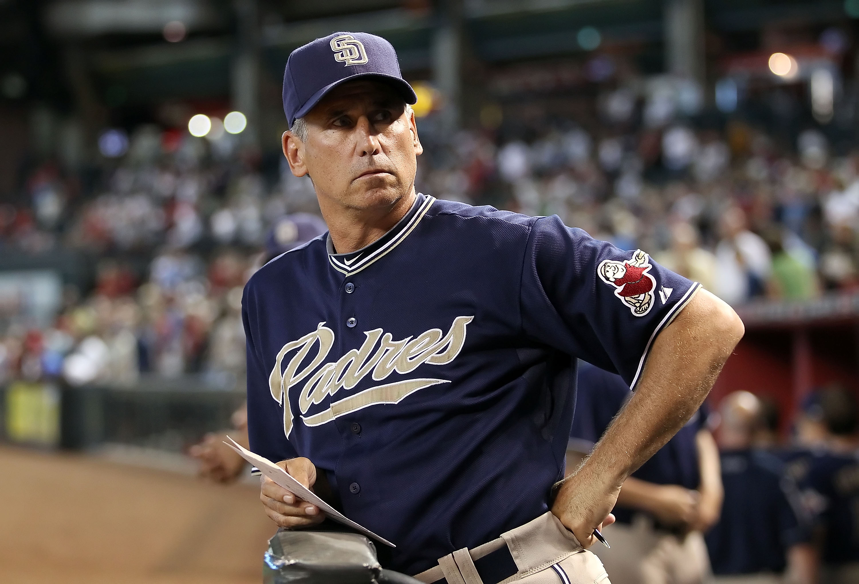 PHOENIX - AUGUST 08:  Manager Bud Black of the San Diego Padres watches from the dugout during the Major League Baseball game against the Arizona Diamondbacks at Chase Field on August 8, 2010 in Phoenix, Arizona.  (Photo by Christian Petersen/Getty Images