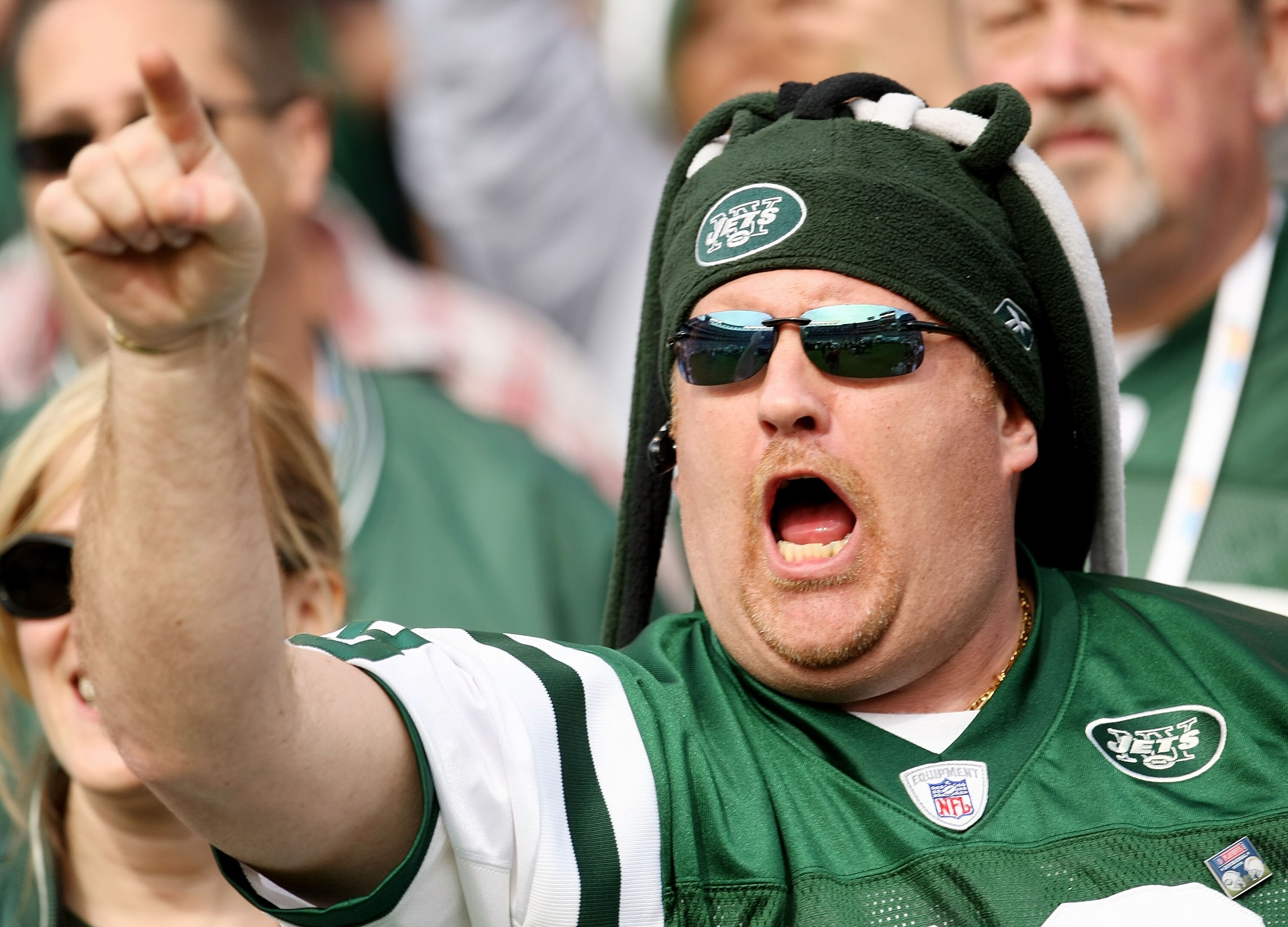 SAN DIEGO - JANUARY 17:  A fan of the New York Jets cheers prior to the AFC Divisional Playoff Game against the San Diego Chargers at Qualcomm Stadium on January 17, 2010 in San Diego, California.  (Photo by Stephen Dunn/Getty Images)