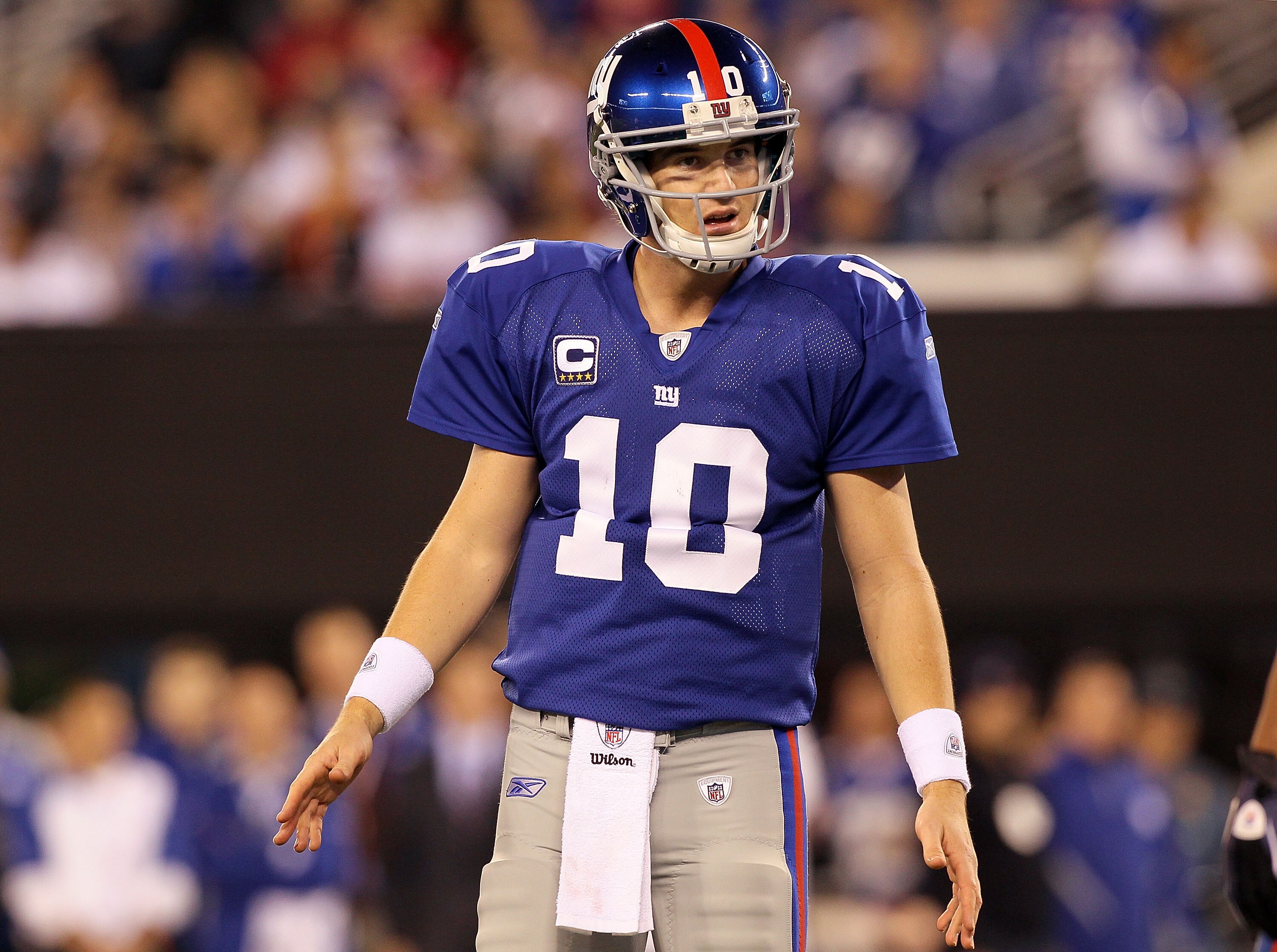 EAST RUTHERFORD, NJ - NOVEMBER 14:  Eli Manning #10 of the New York Giants looks on against the Dallas Cowboys on November 14, 2010 at the New Meadowlands Stadium in East Rutherford, New Jersey.  (Photo by Jim McIsaac/Getty Images)