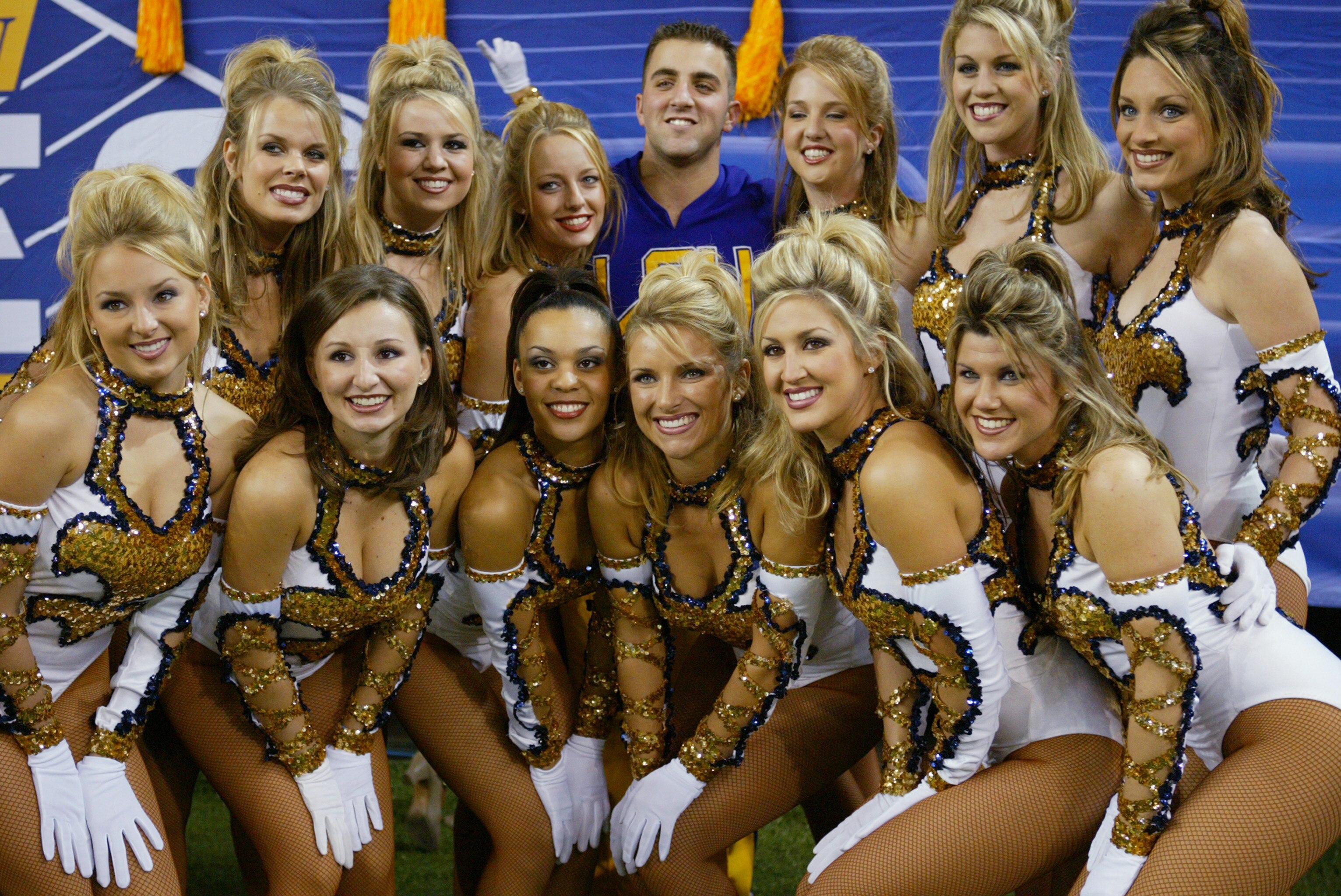 ATLANTA, GA - DECEMBER 6:  The Tiger Girls, the dance team at LSU, pose for a picutre during the SEC Championship Game against the Georgia Bulldogs on December 6, 2003 at the Georgia Dome in Atlanta, Georgia. LSU defeated Georgia 34-13. (Photo by Jamie Sq