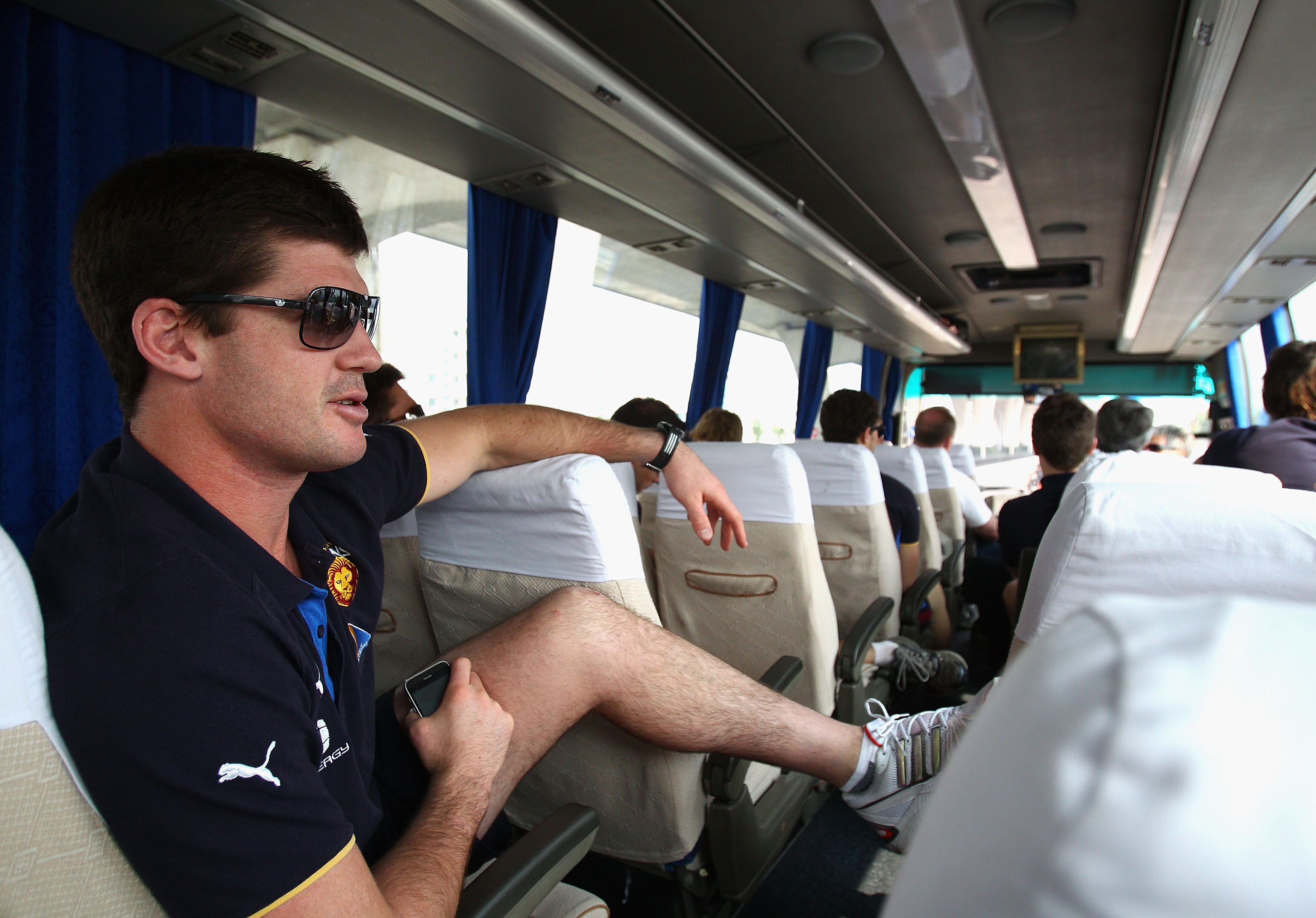 SHANGHAI, CHINA - OCTOBER 16:  Jonathan Brown of the Lions rides on the team bus through central Shanghai on October 16, 2010 in Shanghai, China. The Melbourne Demons will play the Brisbane Lions in an AFL trial match at Jiangwan Sports Centre on Sunday.