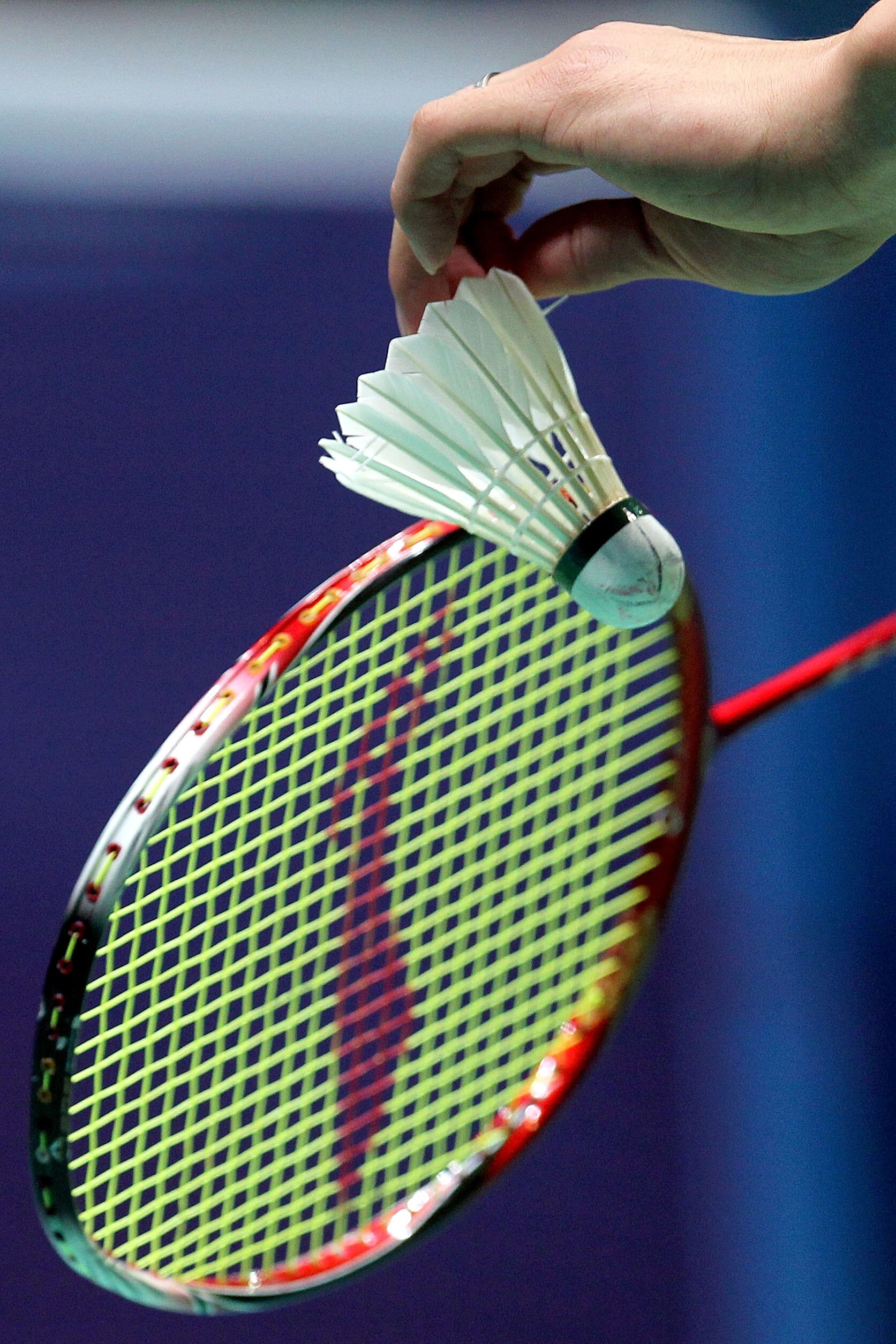 GUANGZHOU, CHINA - NOVEMBER 15:  A shuttlecock and racket is seen on the ground at the men's team badminton final at Tianhe Gymnasium during day three of the 16th Asian Games Guangzhou 2010 on November 15, 2010 in Guangzhou, China.  (Photo by Ronald Marti