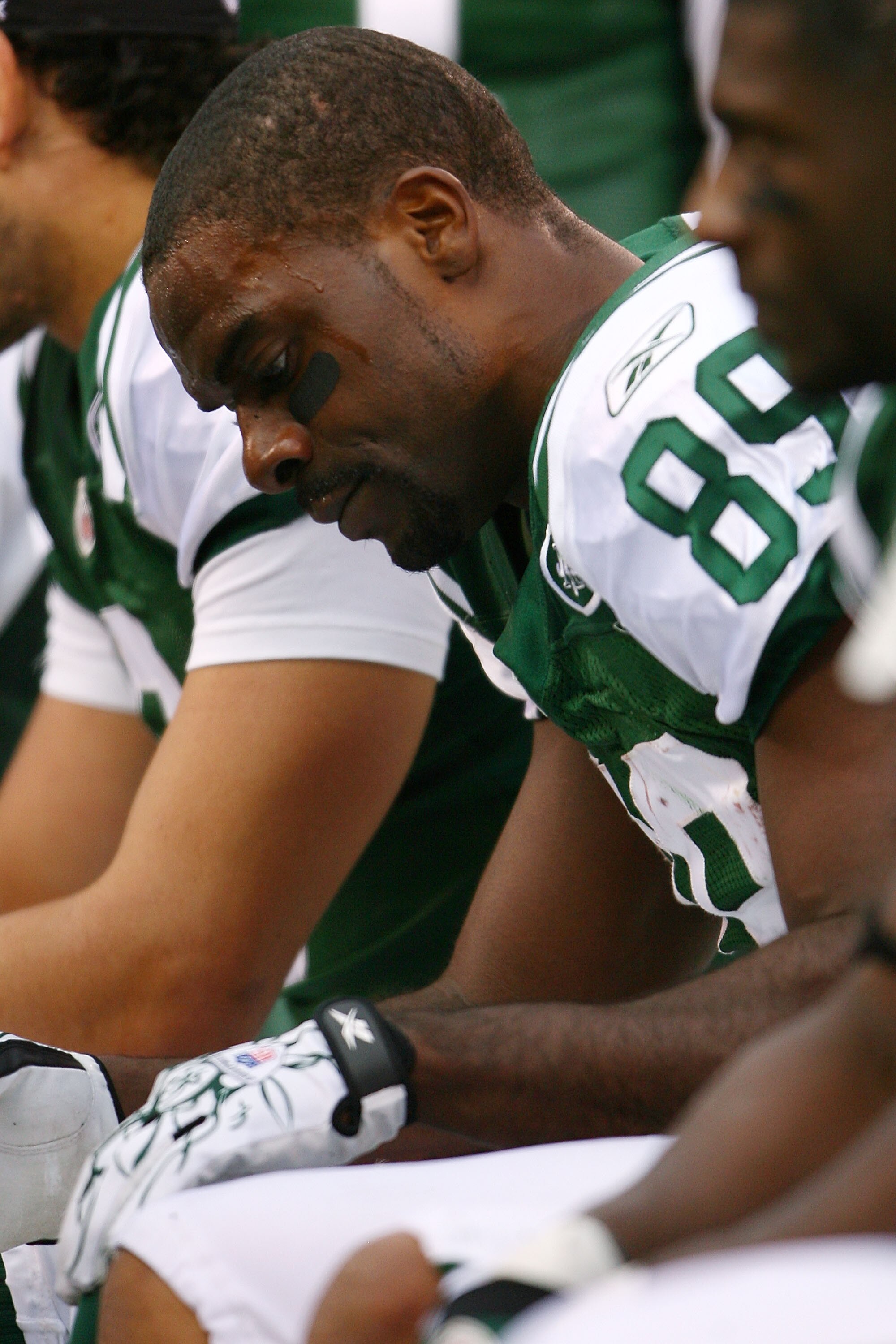 EAST RUTHERFORD, NJ - OCTOBER 31:   Jerricho Cotchery #89 of the New York Jets sits on the bench during the fourth quarter of a game against the Green Bay Packers on October 31, 2010 at the New Meadowlands Stadium in East Rutherford, New Jersey. The Packe
