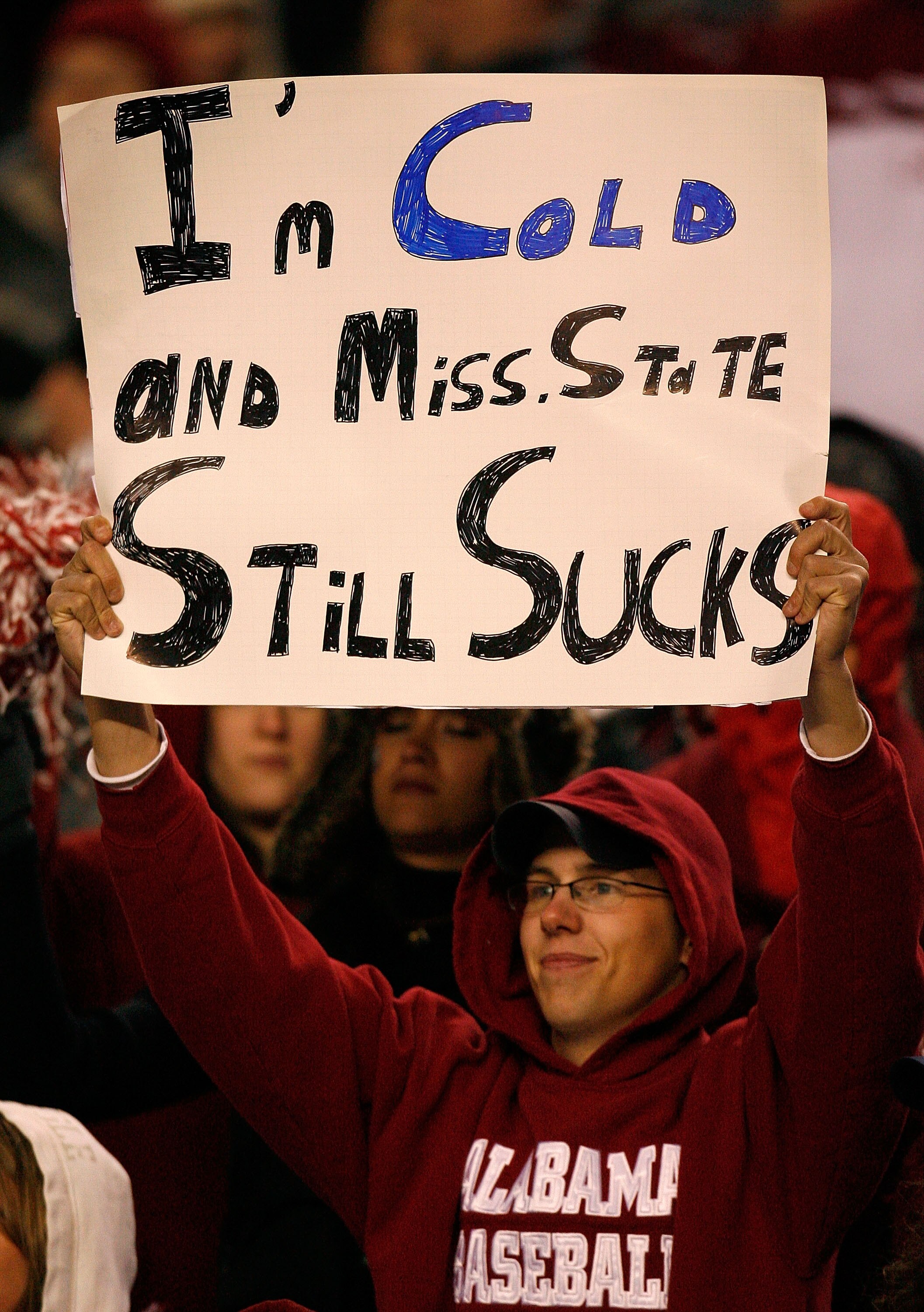 TUSCALOOSA, AL - NOVEMBER 15:  A fan of the Alabama Crimson Tide cheers during their 32-7 win over the Mississippi State Bulldogs at Bryant-Denny Stadium on November 15, 2008 in Tuscaloosa, Alabama.  (Photo by Kevin C. Cox/Getty Images)