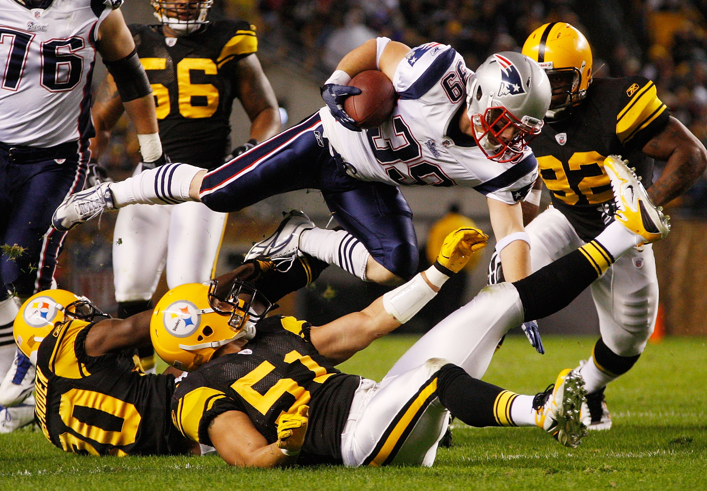 PITTSBURGH - NOVEMBER 14:  Danny Woodhead #39 of the New England Patriots jumps over James Farrior #51 of the Pittsburgh Steelers during the game on November 14, 2010 at Heinz Field in Pittsburgh, Pennsylvania.  (Photo by Jared Wickerham/Getty Images)