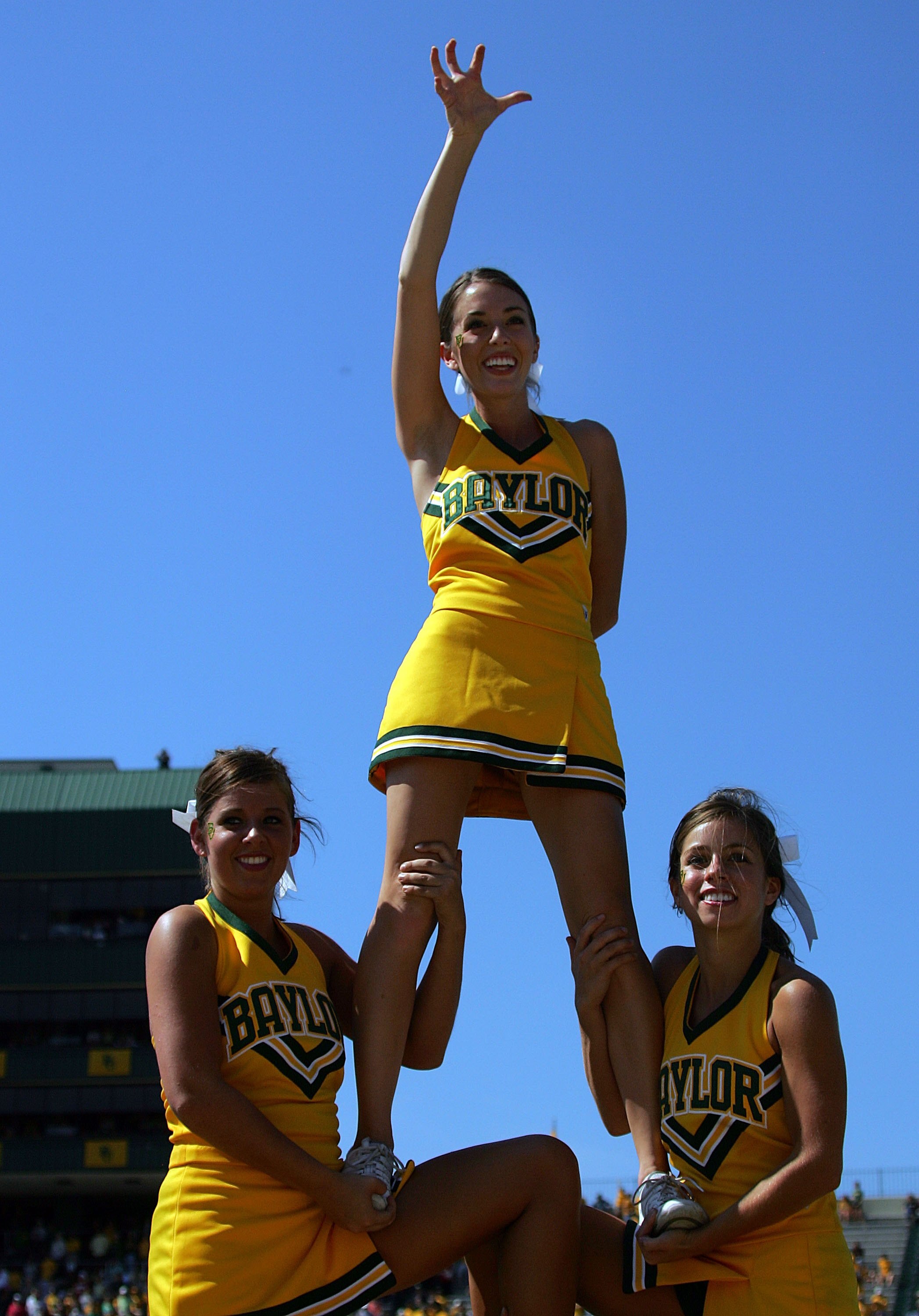 WACO, TX - OCTOBER 04:  The Baylor Bears cheerleaders give a claw during play against the Oklahoma Sooners at Floyd Casey Stadium on October 4, 2008 in Waco, Texas.  (Photo by Ronald Martinez/Getty Images)