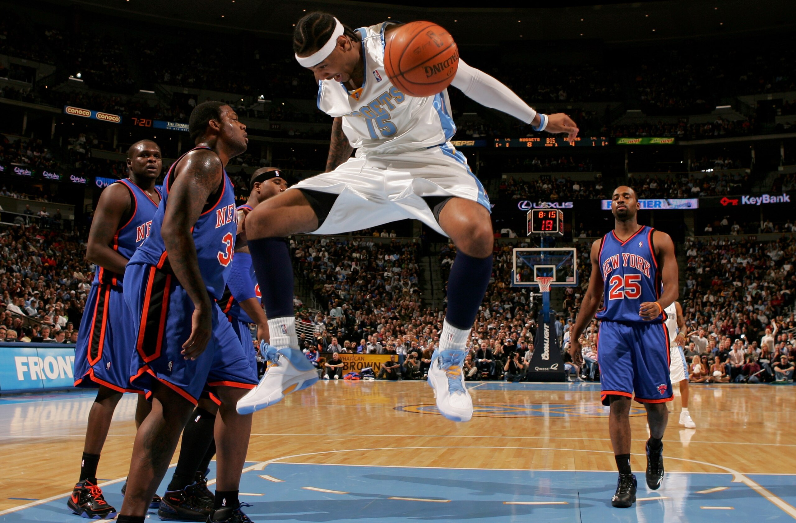 DENVER - NOVEMBER 17:  Carmelo Anthony #15 of the Denver Nuggets follows through as he dunks against the New York Knicks at the Pepsi Center November 17, 2007 in Denver, Colorado.  (Photo by Doug Pensinger/Getty Images)