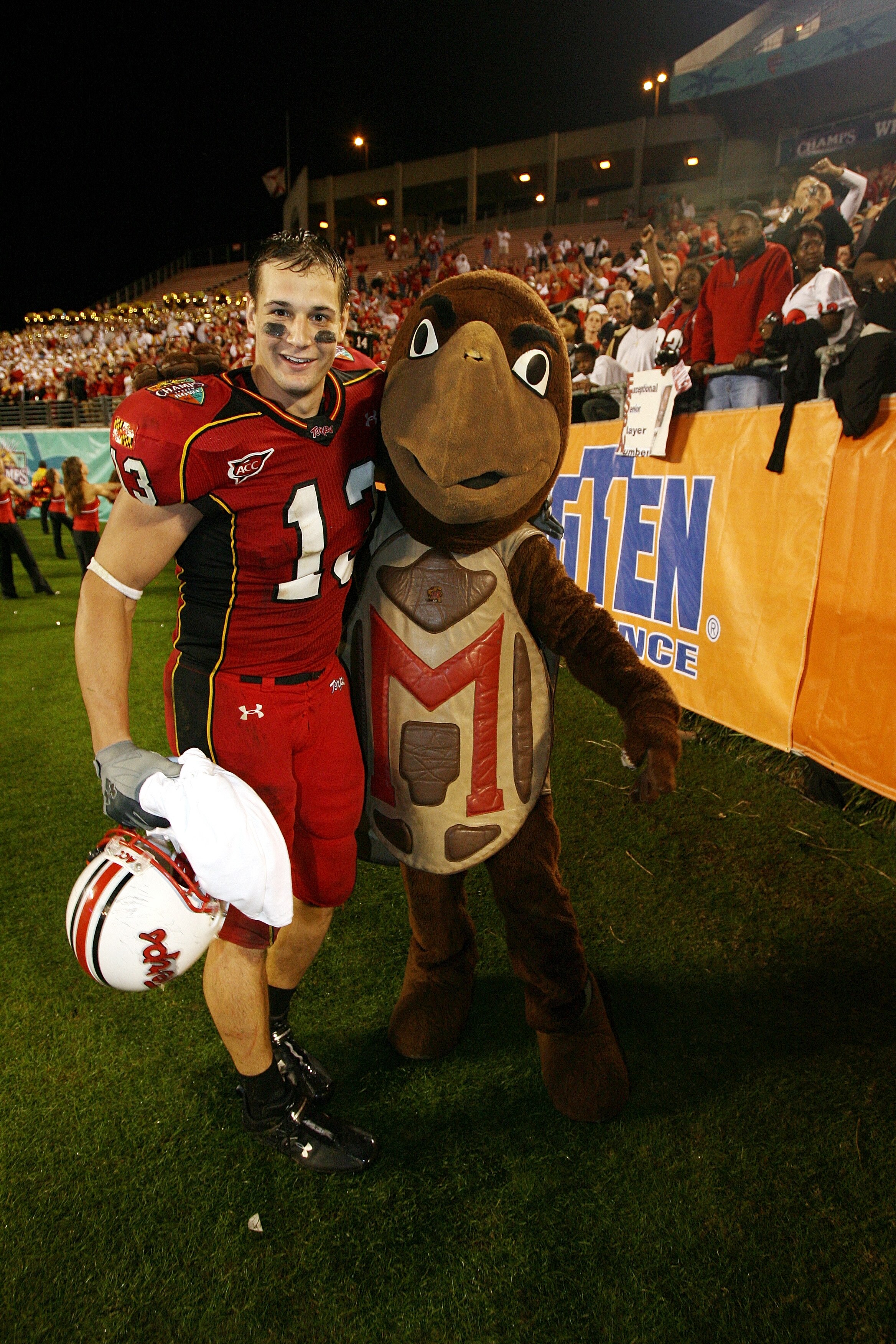 ORLANDO, FL - DECEMBER 29:  Tight end Dan Gronkowski #13 of the Maryland Terrapins poses for a photo with mascot Testudo during the game against the Purdue Boilermakers in the Champs Sports Bowl at Florida Citrus Bowl on December 29, 2006 in Orlando, Flor