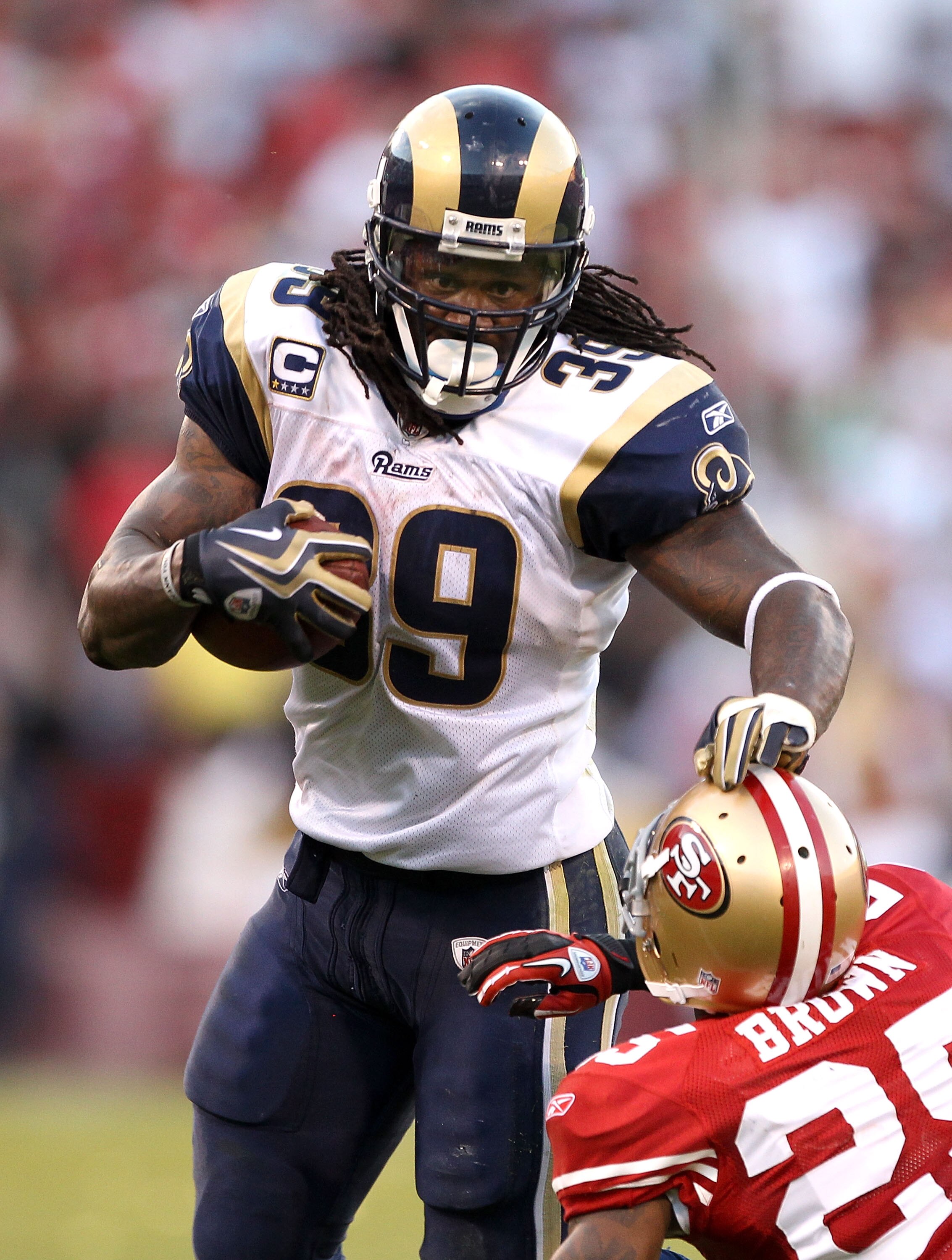 SAN FRANCISCO - NOVEMBER 14:  Steven Jackson #39 of the St. Louis Rams pushes Tarell Brown #25 of the San Francisco 49ers at Candlestick Park on November 14, 2010 in San Francisco, California.  (Photo by Ezra Shaw/Getty Images)