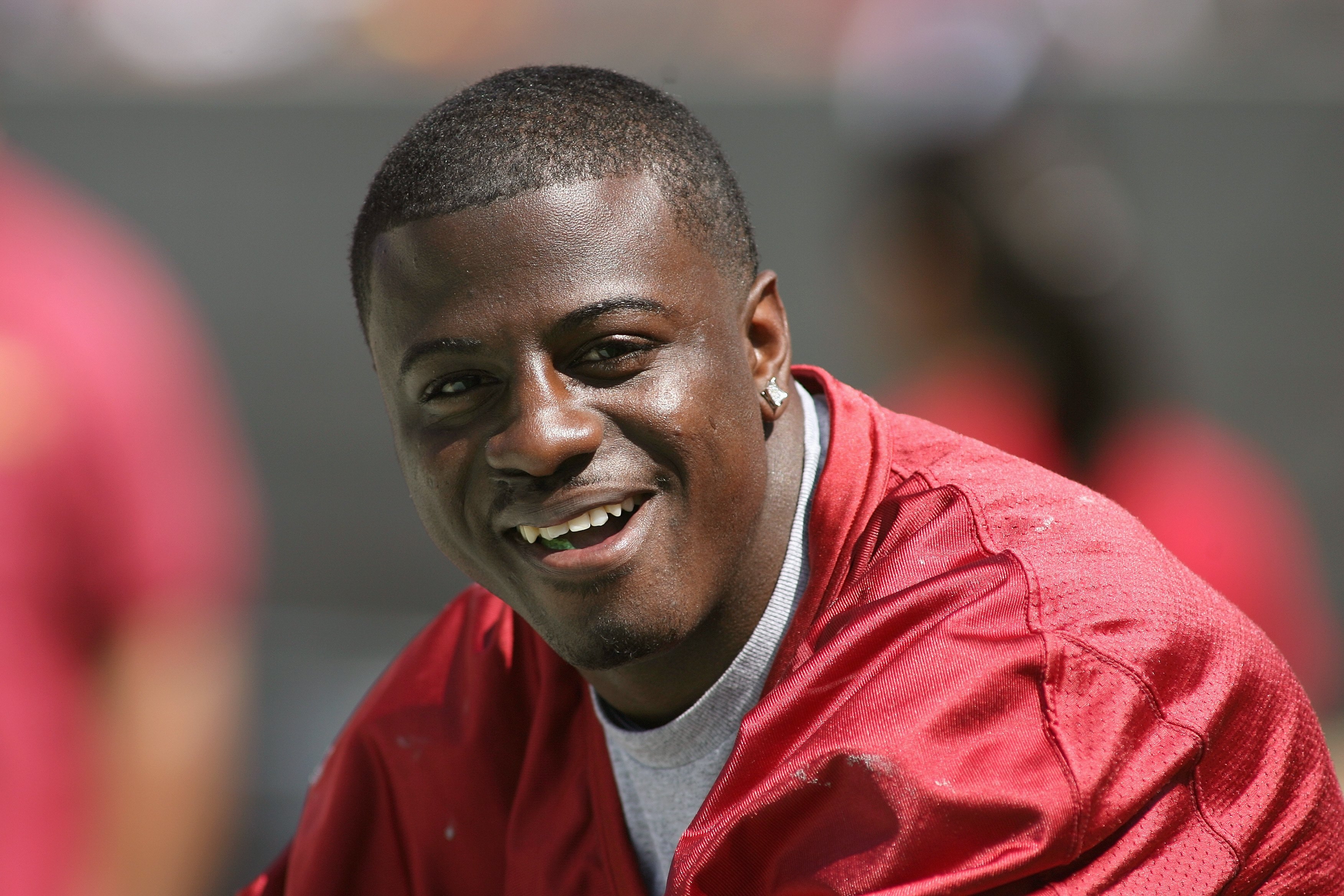 LOS ANGELES, CA - APRIL 25: Shareece Wright #24 of the USC Trojans smiles on the bench during the spring game on April 25, 2009 at the Los Angeles Memorial Coliseum in Los Angeles, California.  The cardinal team won 16-10.  (Photo by Jeff Golden/Getty Ima