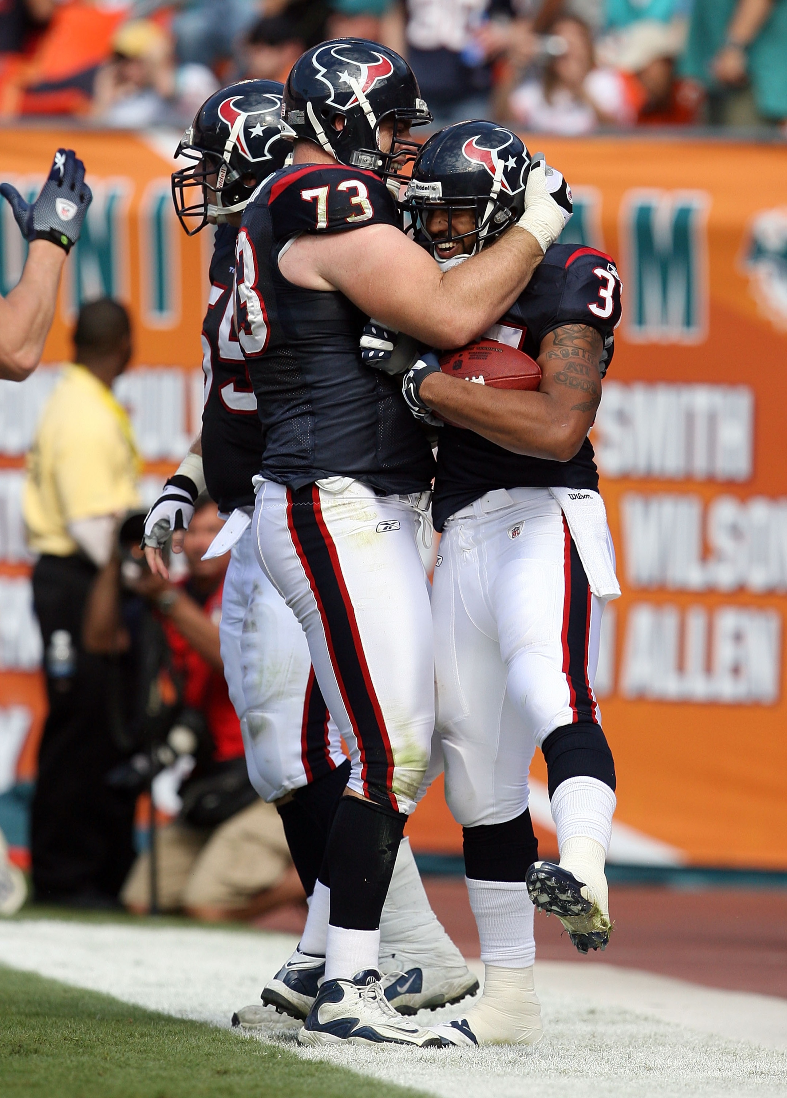 MIAMI - DECEMBER 27: Running back Arian Foster #37 of the Houston Texans celebrates his touchdown run with offensive lineman Eric Winston #73 while taking on the Miami Dolphins at Land Shark Stadium on December 27, 2009 in Miami, Florida. (Photo by Doug MIAMI - DECEMBER 27: Running back Arian Foster #37 of the Houston Texans celebrates his touchdown run with offensive lineman Eric Winston #73 while taking on the Miami Dolphins at Land Shark Stadium on December 27, 2009 in Miami, Florida. (Photo by Doug