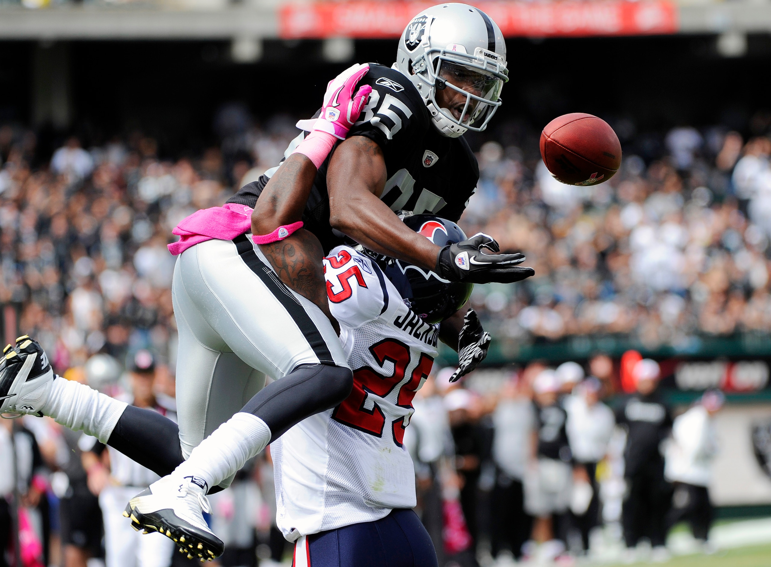 OAKLAND, CA - OCTOBER 3: Defensive Back Kareem Jackson #25 of the Houston Texans breaks up a pass in the endzone to wide receiver Darrius Heyward-Bey #85 of the Oakland Raiders during an NFL football game October 3, 2010 at The Oakland-Alameda County Coli OAKLAND, CA - OCTOBER 3: Defensive Back Kareem Jackson #25 of the Houston Texans breaks up a pass in the endzone to wide receiver Darrius Heyward-Bey #85 of the Oakland Raiders during an NFL football game October 3, 2010 at The Oakland-Alameda County Coli