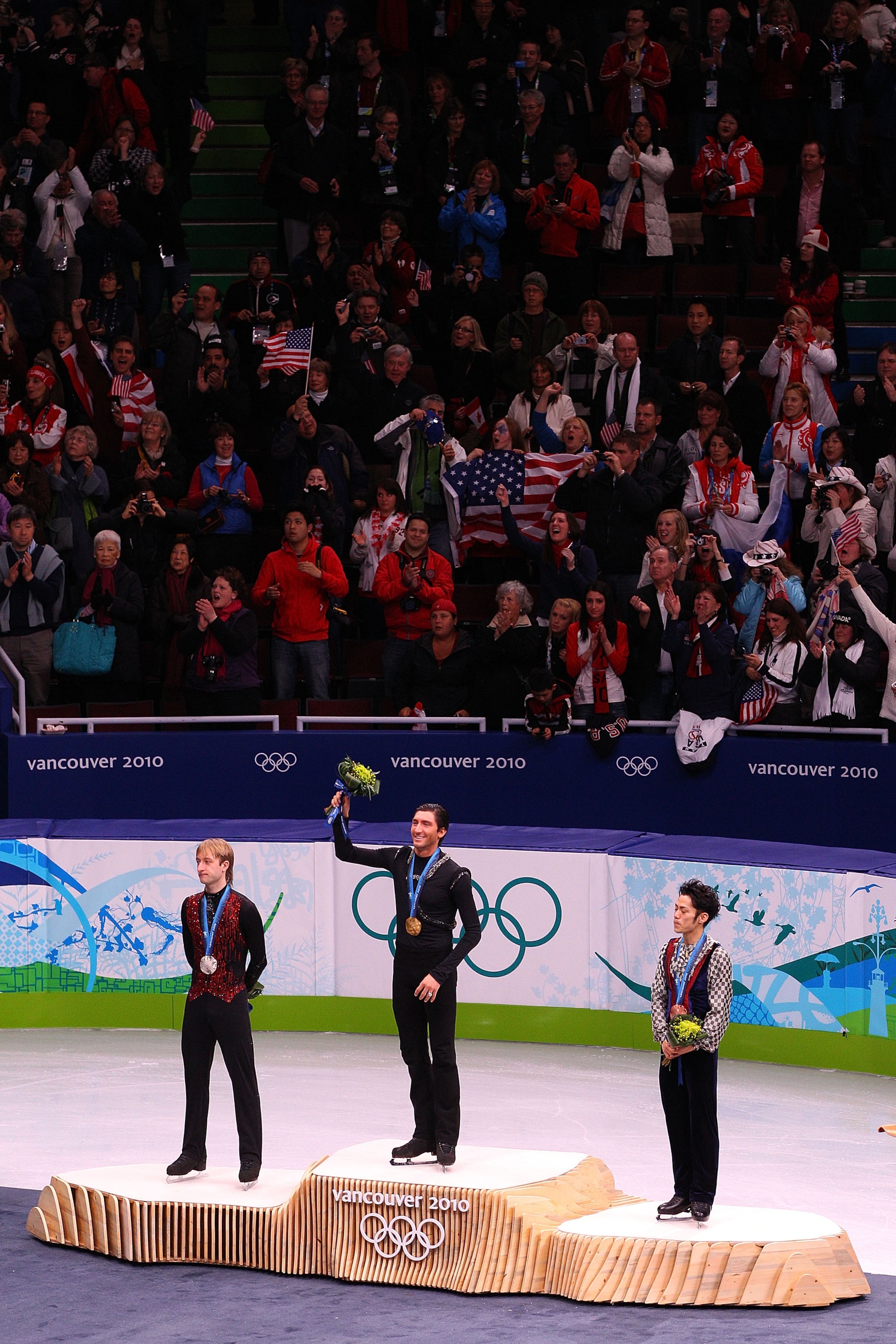 VANCOUVER, BC - FEBRUARY 18:  Gold medalist Evan Lysacek (C) of the United States poses with silver medalist Evgeni Plushenko (L) of Russia and bronze medalist Daisuke Takahashi of Japan in the men's figure skating free skating on day 7 of the Vancouver 2