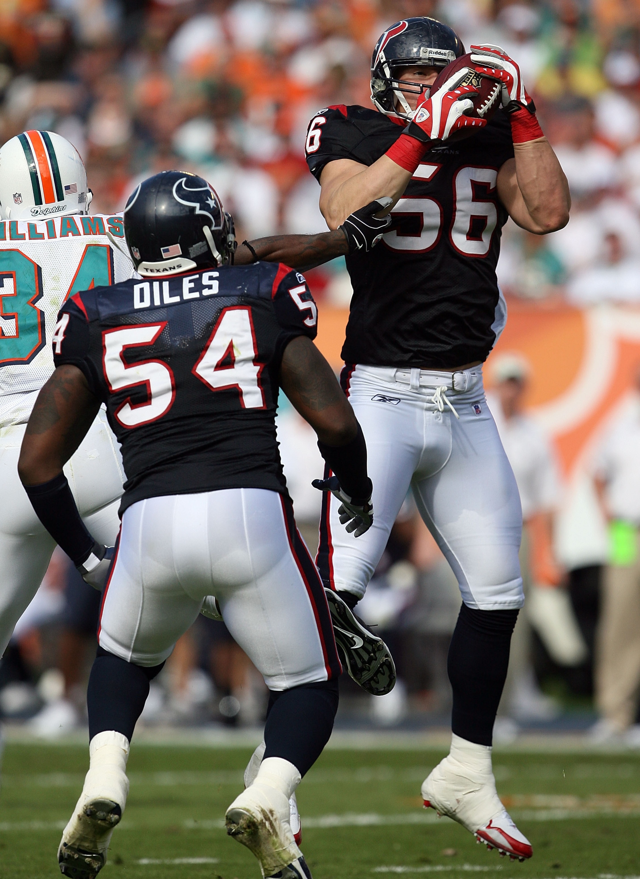 MIAMI - DECEMBER 27: Linebacker Brian Cushing #56 of the Houston Texans intercepts a pass intended for Ricky Williams #34 of the Miami Dolphins at Land Shark Stadium on December 27, 2009 in Miami, Florida. (Photo by Doug Benc/Getty Images) MIAMI - DECEMBER 27: Linebacker Brian Cushing #56 of the Houston Texans intercepts a pass intended for Ricky Williams #34 of the Miami Dolphins at Land Shark Stadium on December 27, 2009 in Miami, Florida. (Photo by Doug Benc/Getty Images)