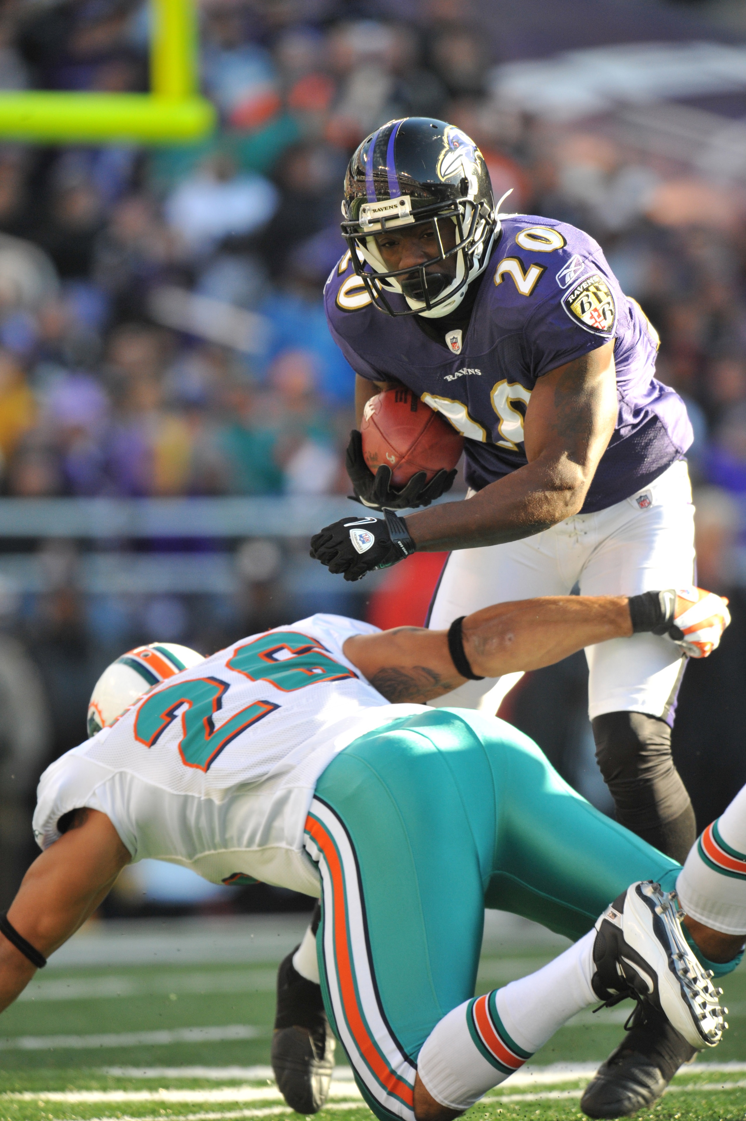 BALTIMORE, MD - NOVEMBER 7:  Ed Reed #20 of the Baltimore Ravens returns a punt against the Miami Dolphins at M&T Bank Stadium on November 7, 2010 in Baltimore, Maryland. The Ravens defeated the Dolphins 26-10. (Photo by Larry French/Getty Images)