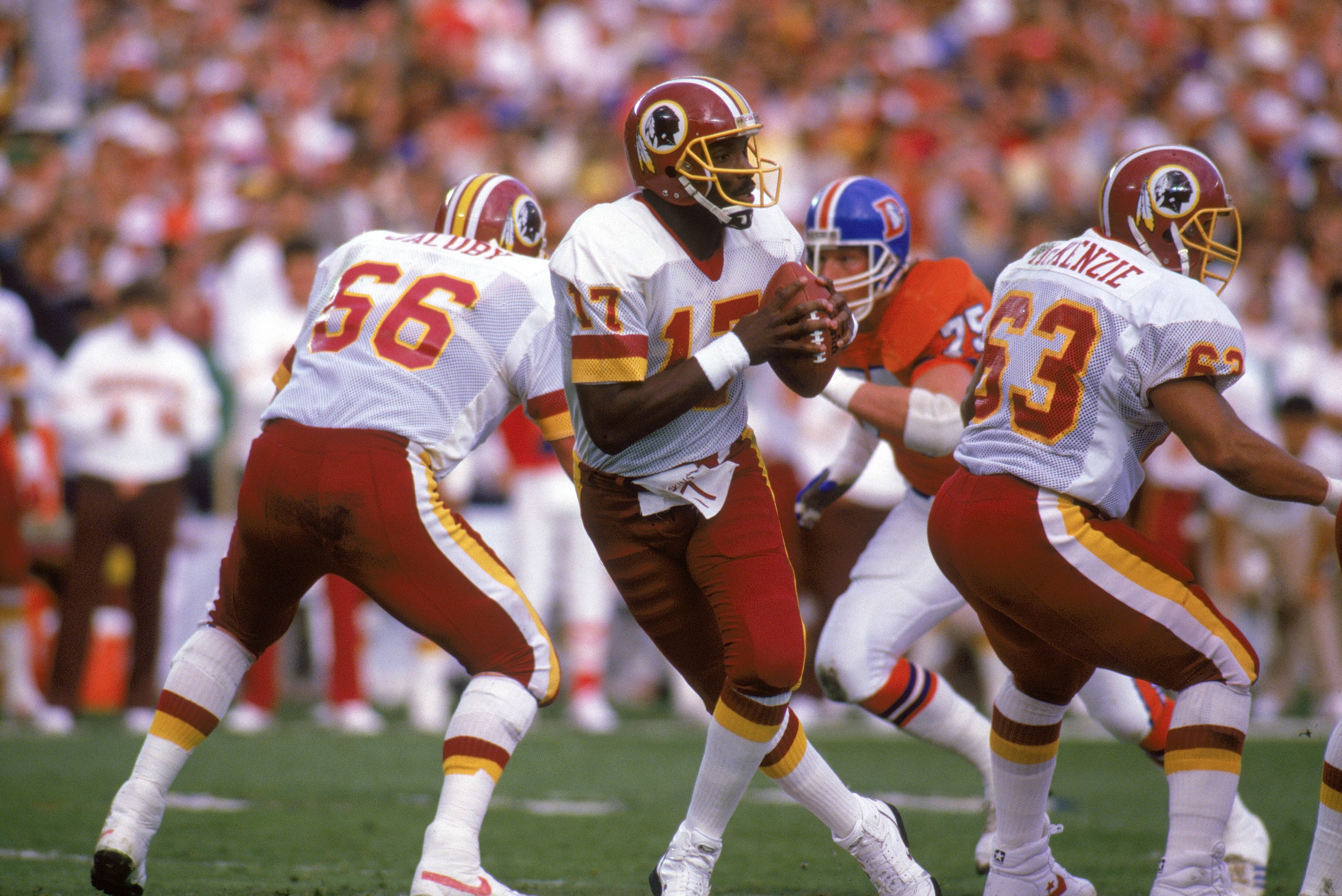 SAN DIEGO - JANUARY 31:  Quarterback Doug Williams #17 of the Washington Redskins drops back to pass during Super Bowl XXII against the Denver Broncos at Jack Murphy Stadium on January 31, 1988 in San Diego, California.  The Redskins won 42-10.  (Photo by