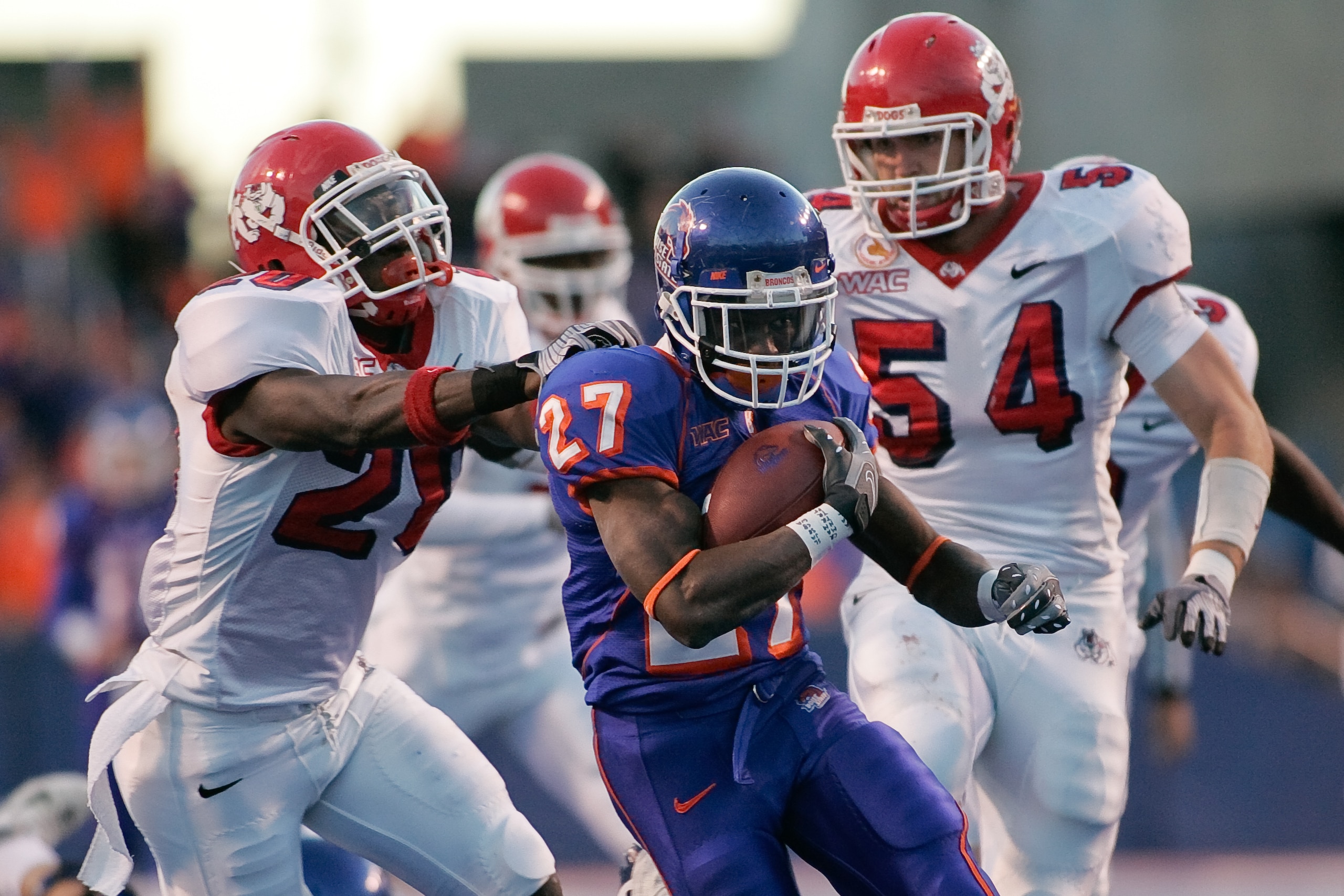 BOISE, ID - NOVEMBER 28: Jeremy Avery #27 of the Boise State Broncos runs against the Fresno State Bulldogs during their game on November 28, 2008 at Bronco Stadium in Boise, Idaho.  (Photo by Otto Kitsinger III/Getty Images)