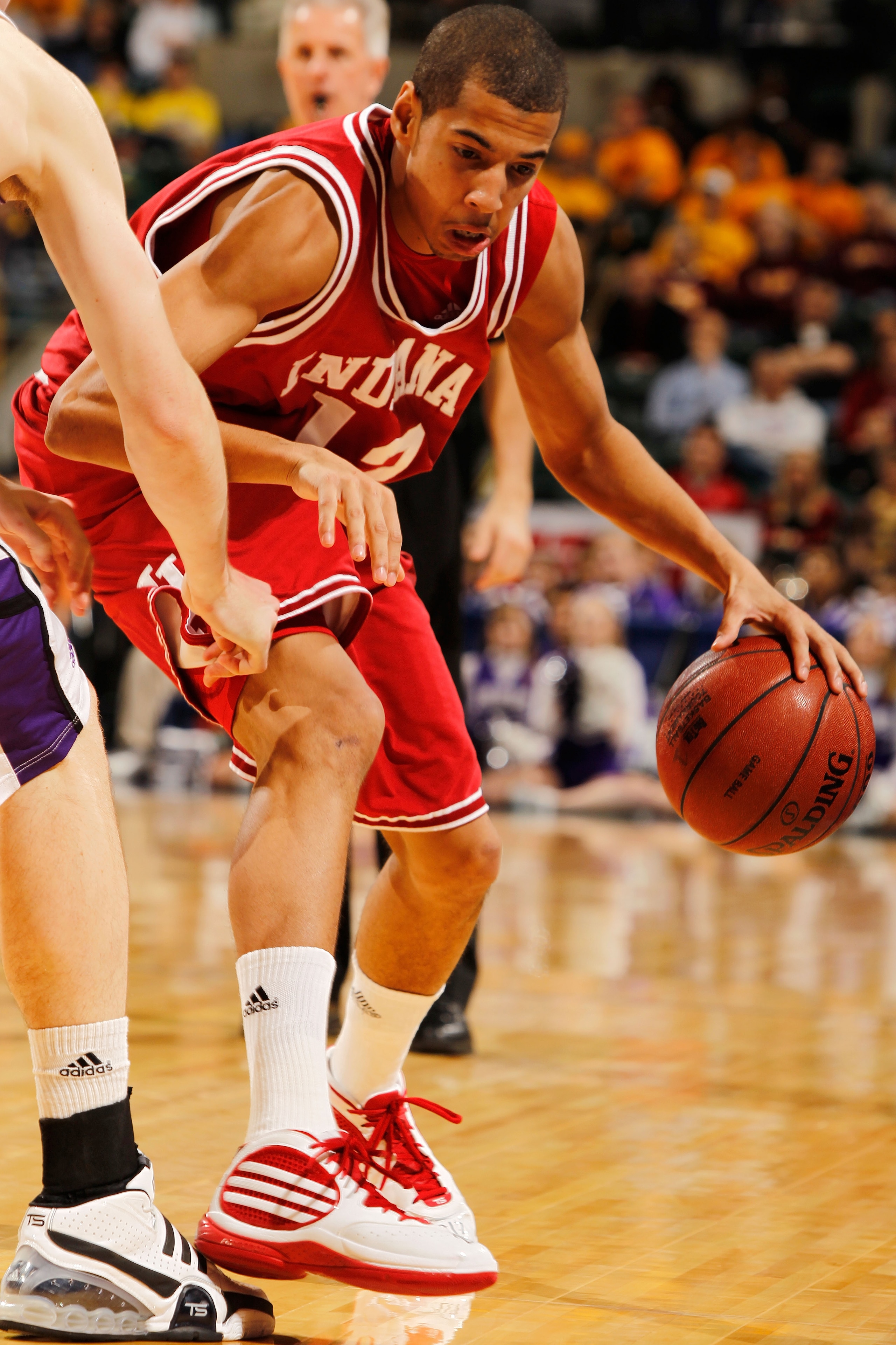 INDIANAPOLIS - MARCH 11:  Guard Verdell Jones III #12 of the Indiana Hoosiers drives with the ball against the Northwestern Wildcats during the first round of the Big Ten Men's Basketball Tournament at Conseco Fieldhouse on March 11, 2010 in Indianapolis,
