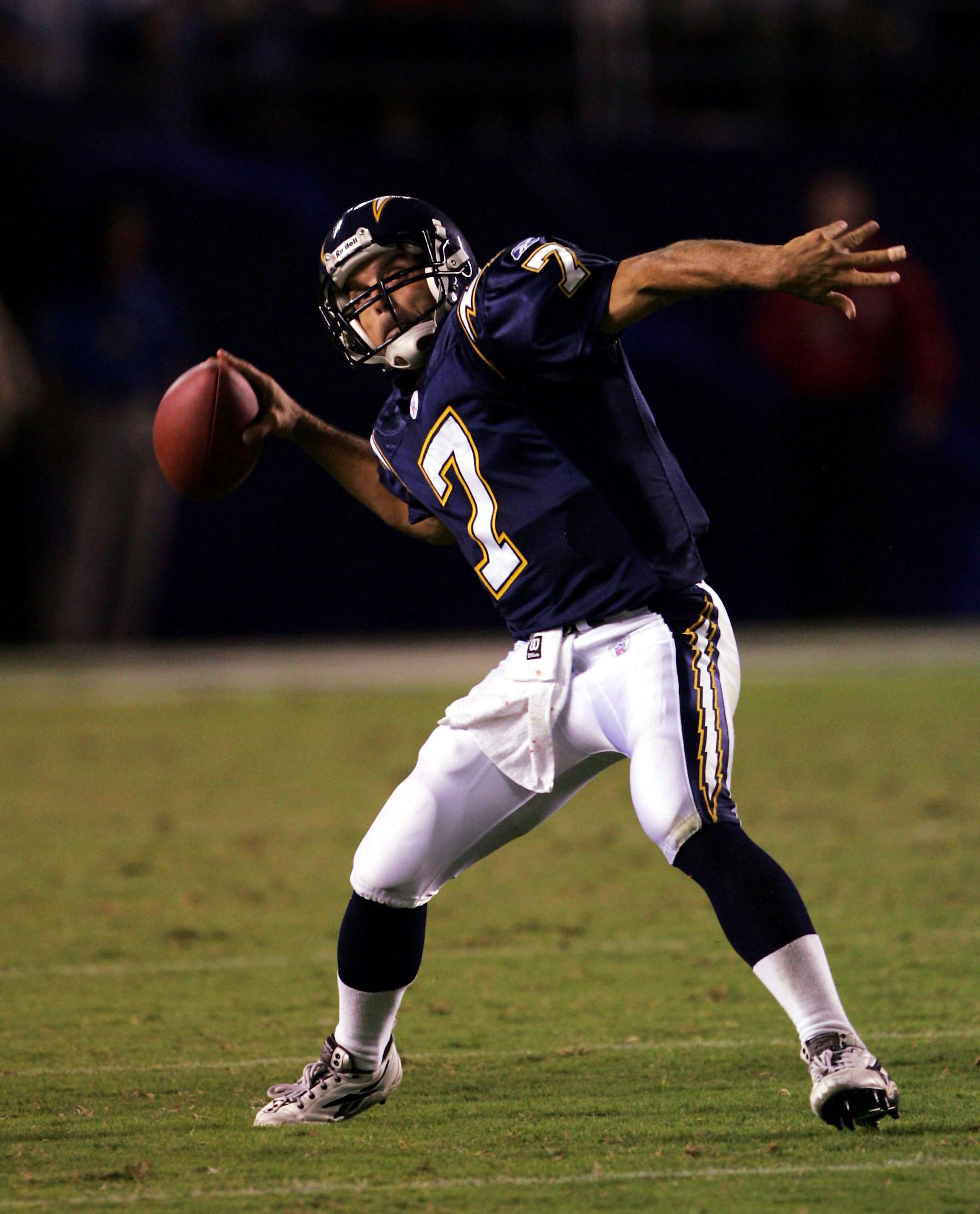 SAN DIEGO, CA - AUGUST 27:  Quarterback Doug Flutie #7 of the San Diego Chargers throws a pass against the Seattle Seahawks in their preseason game on August 27, 2004 at Qualcomm Stadium in San Diego, California.  The Seahawks won 26-20. (Photo by Stephen