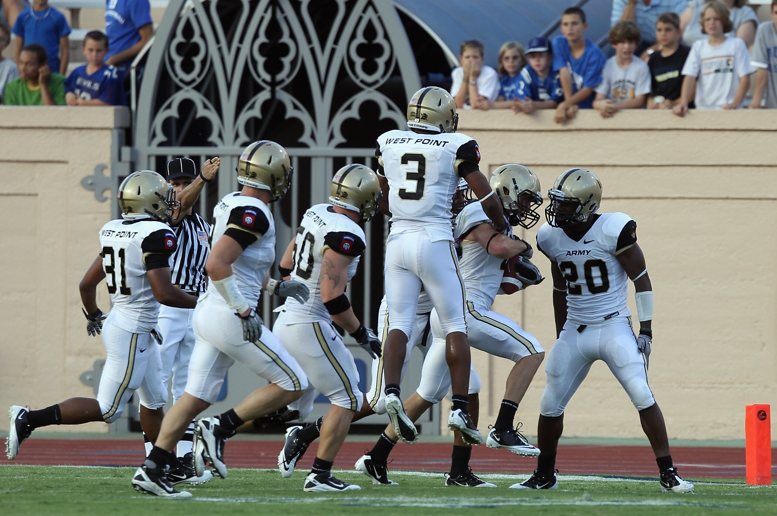 DURHAM, NC - SEPTEMBER 25:  Richard King #2 of the Army Black Knights celebrates with teammates after an interception that sealed the game in a 35-21 victory over the Duke Blue Devils at Wallace Wade Stadium on September 25, 2010 in Durham, North Carolina