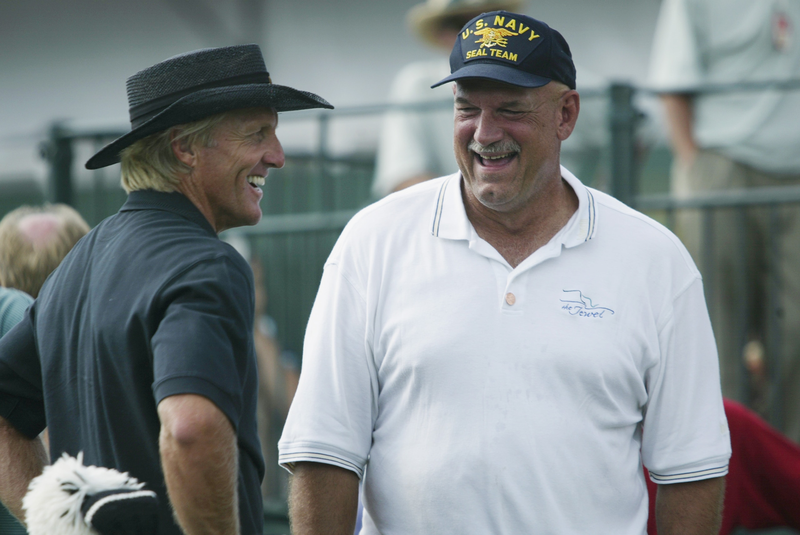 CHASKA, MN - AUGUST 13: Greg Norman chats with Minnesota Governor Jesse Ventura during the PGA Champion's Clinic on August 13, 2002 at the PGA Championship at Hazeltine National Golf Club in Chaska, Minnesota. (Photo by Andy Lyons/Getty Images) CHASKA, MN - AUGUST 13: Greg Norman chats with Minnesota Governor Jesse Ventura during the PGA Champion's Clinic on August 13, 2002 at the PGA Championship at Hazeltine National Golf Club in Chaska, Minnesota. (Photo by Andy Lyons/Getty Images)