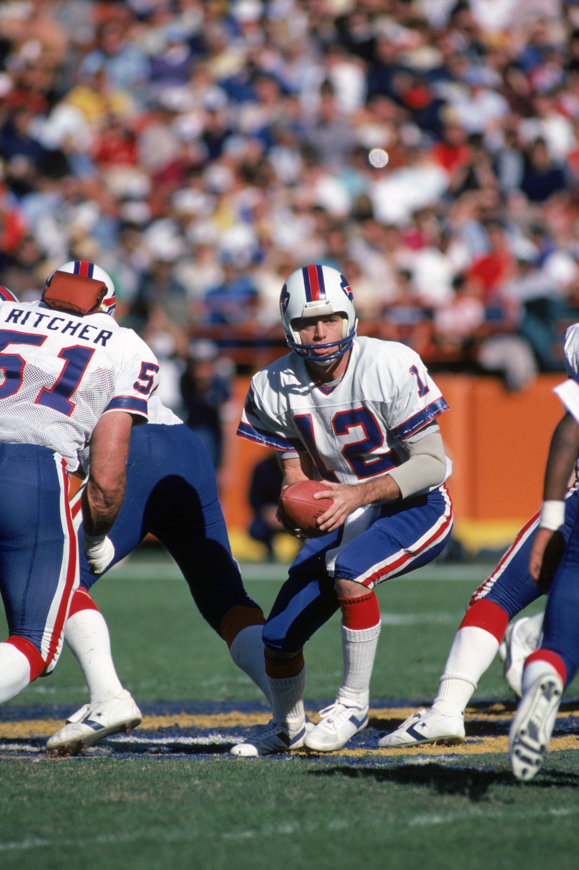 ANAHEIM, CA - NOVEMBER 27:  Quarterback Joe Ferguson #12 of the Buffalo Bills runs a play during a game against the Los Angeles Rams at Anaheim Stadium on November 27, 1983 in Anaheim, California.  The Rams won 41-17.  (Photo by George Rose/Getty Images)