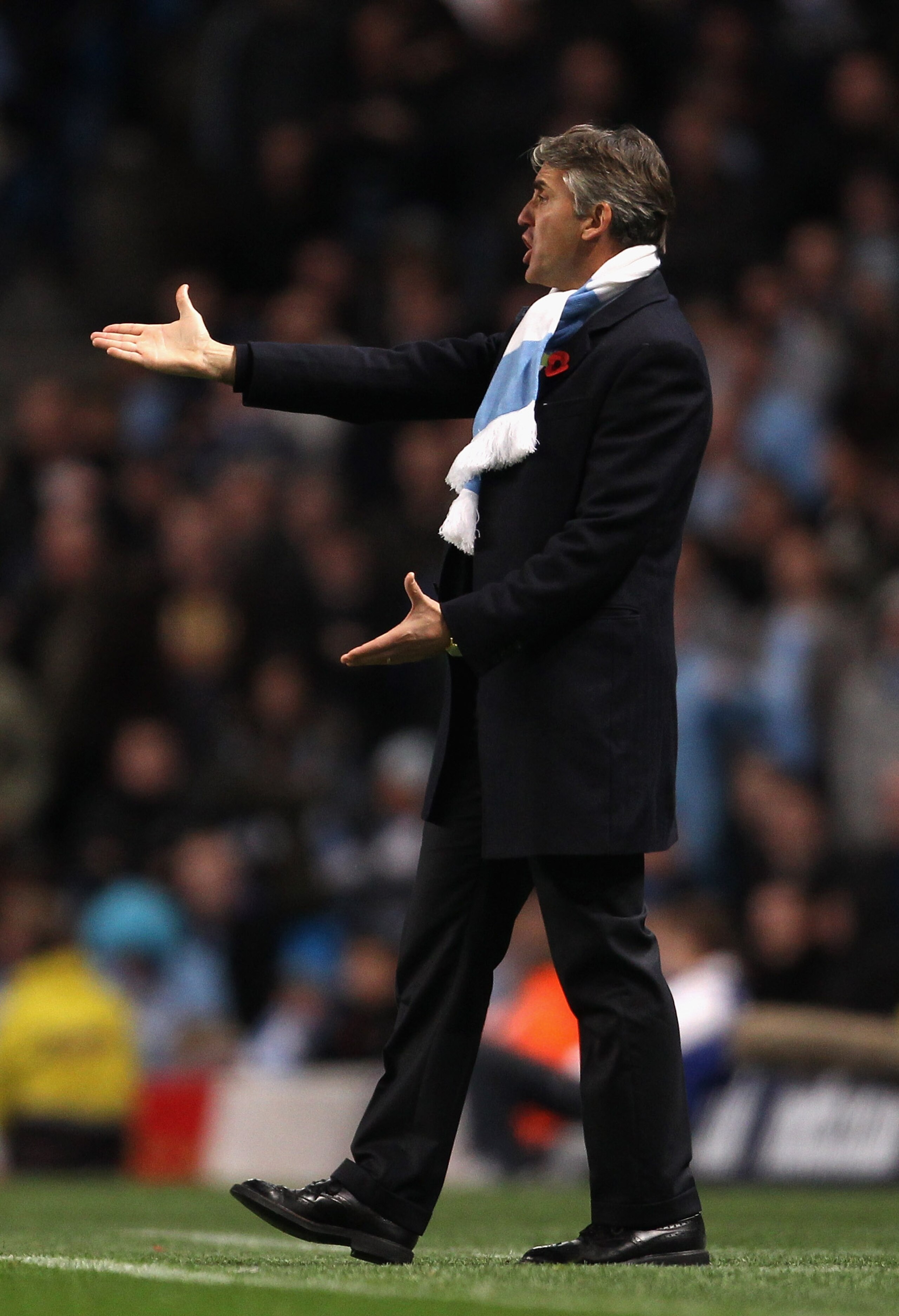 MANCHESTER, ENGLAND - NOVEMBER 13: Roberto Mancini the manager of Manchester City reacts during the Barclays Premier League match between Manchester City and Birmingham City at City of Manchester Stadium on November 13, 2010 in Manchester, England. (Pho MANCHESTER, ENGLAND - NOVEMBER 13: Roberto Mancini the manager of Manchester City reacts during the Barclays Premier League match between Manchester City and Birmingham City at City of Manchester Stadium on November 13, 2010 in Manchester, England. (Pho