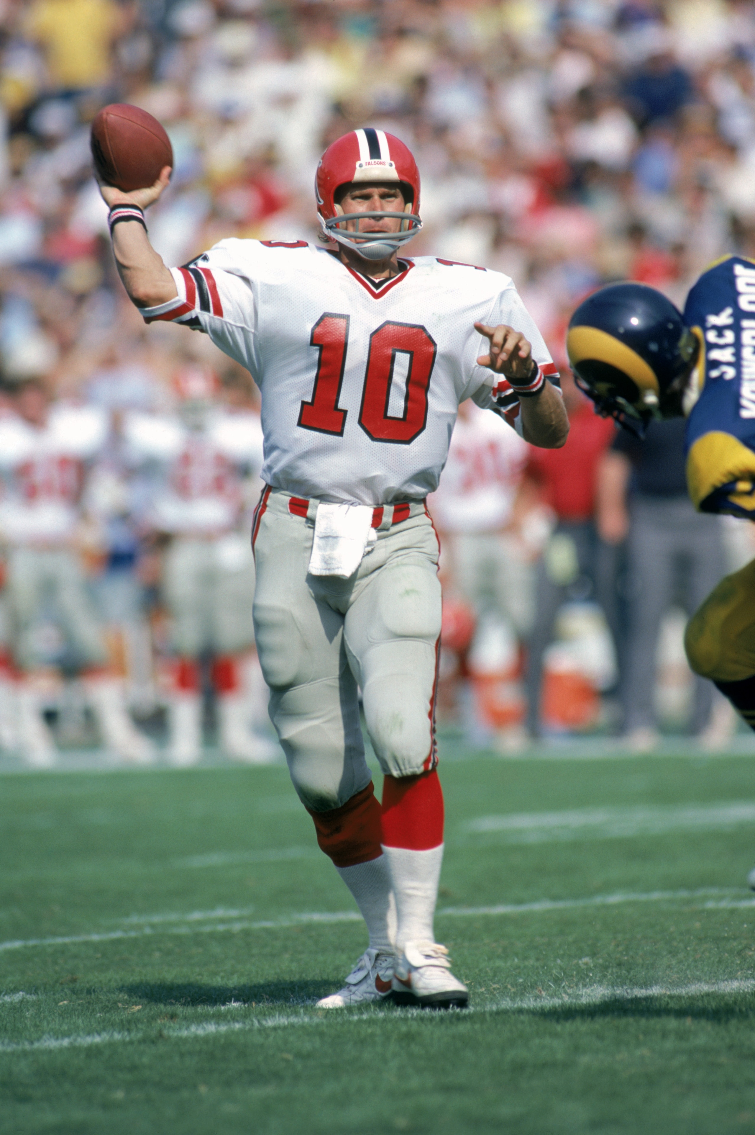 ANAHEIM, CA - OCTOBER 16: Quarterback Steve Bartkowski #10 of the Atlanta Falcons throws a pass during a game against the Los Angeles Rams at Anaheim Stadium on October 16, 1983 in Anaheim, California. The Rams won 27-21. (Photo by George Rose/Getty Im ANAHEIM, CA - OCTOBER 16: Quarterback Steve Bartkowski #10 of the Atlanta Falcons throws a pass during a game against the Los Angeles Rams at Anaheim Stadium on October 16, 1983 in Anaheim, California. The Rams won 27-21. (Photo by George Rose/Getty Im