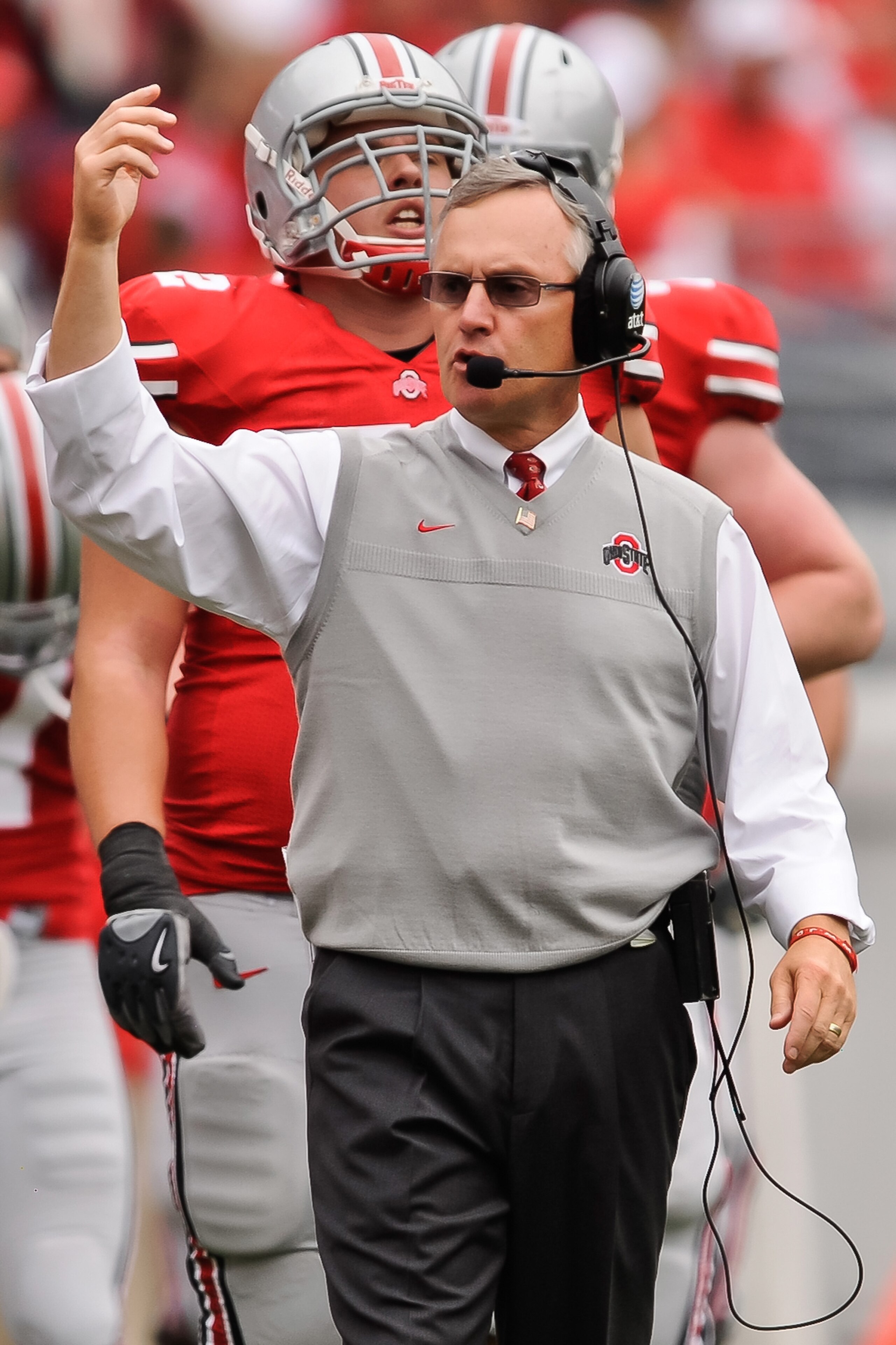 COLUMBUS, OH - OCTOBER 23:  Head Coach Jim Tressel of the Ohio State Buckeyes calls his team together during a game against the Purdue Boilermakers at Ohio Stadium on October 23, 2010 in Columbus, Ohio.  (Photo by Jamie Sabau/Getty Images)