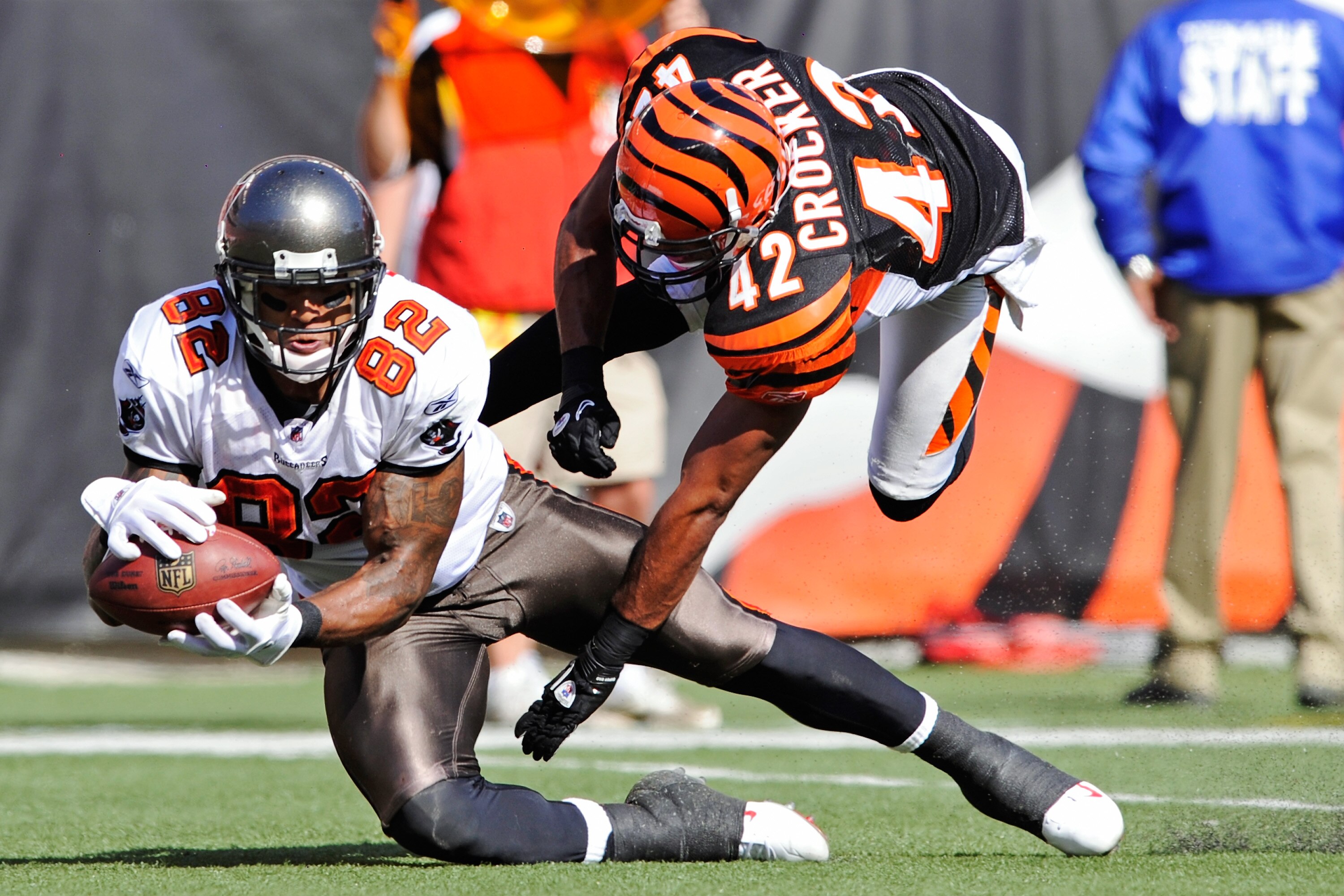 CINCINNATI, OH - OCTOBER 10:  Kellen Winslow #82 of the Tampa Bay Buccaneers pulls in a pass reception as Chris Crocker #42 of the Cincinnati Bengals defends at Paul Brown Stadium on October 10, 2010 in Cincinnati, Ohio.  (Photo by Jamie Sabau/Getty Image