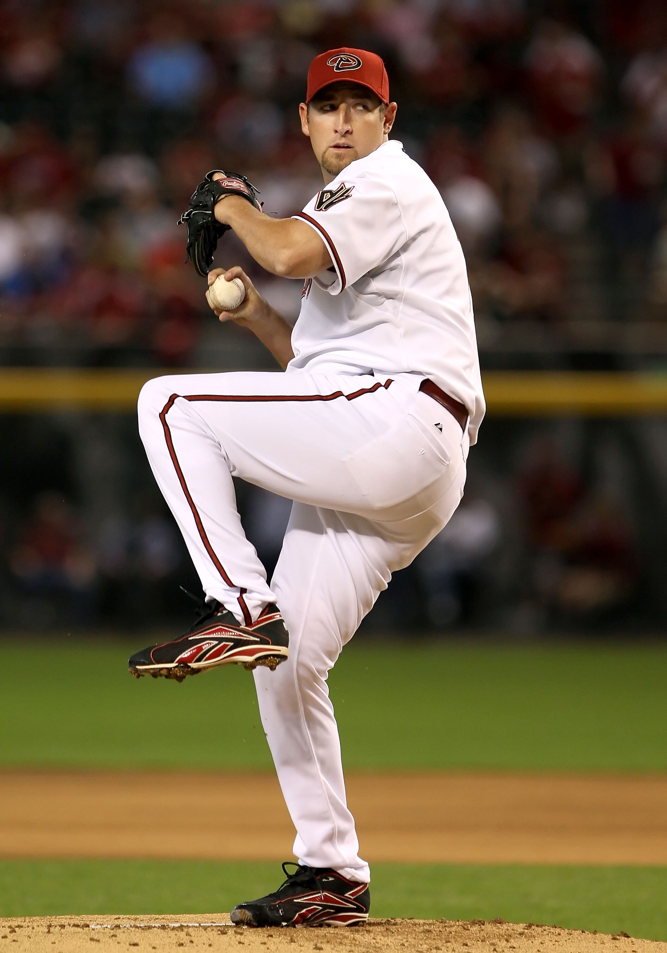 PHOENIX - APRIL 06:  Starting pitcher Brandon Webb #17 of the Arizona Diamondbacks pitches against the Colorado Rockies during the MLB openning day game at Chase Field on April 6, 2009 in Phoenix, Arizona.  The Diamondbacks defeated the Rockies 9-8. (Phot