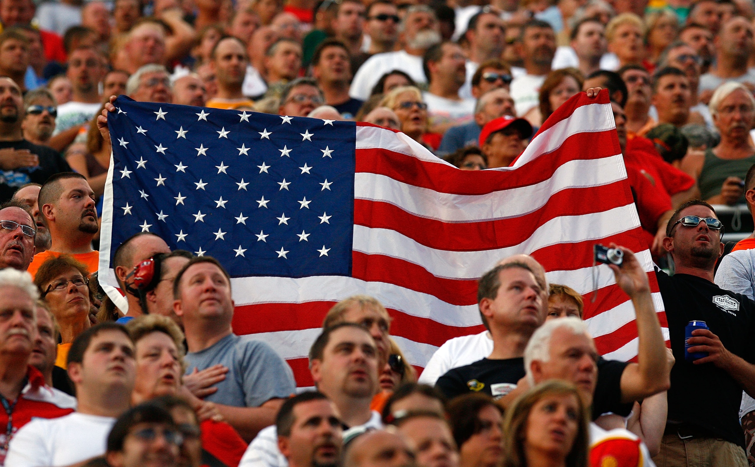 BRISTOL, TN - AUGUST 21:  fans watch pre-race ceremonies prior to the NASCAR Sprint Cup Series IRWIN Tools Night Race at Bristol Motor Speedway on August 21, 2010 in Bristol, Tennessee.  (Photo by Jason Smith/Getty Images)