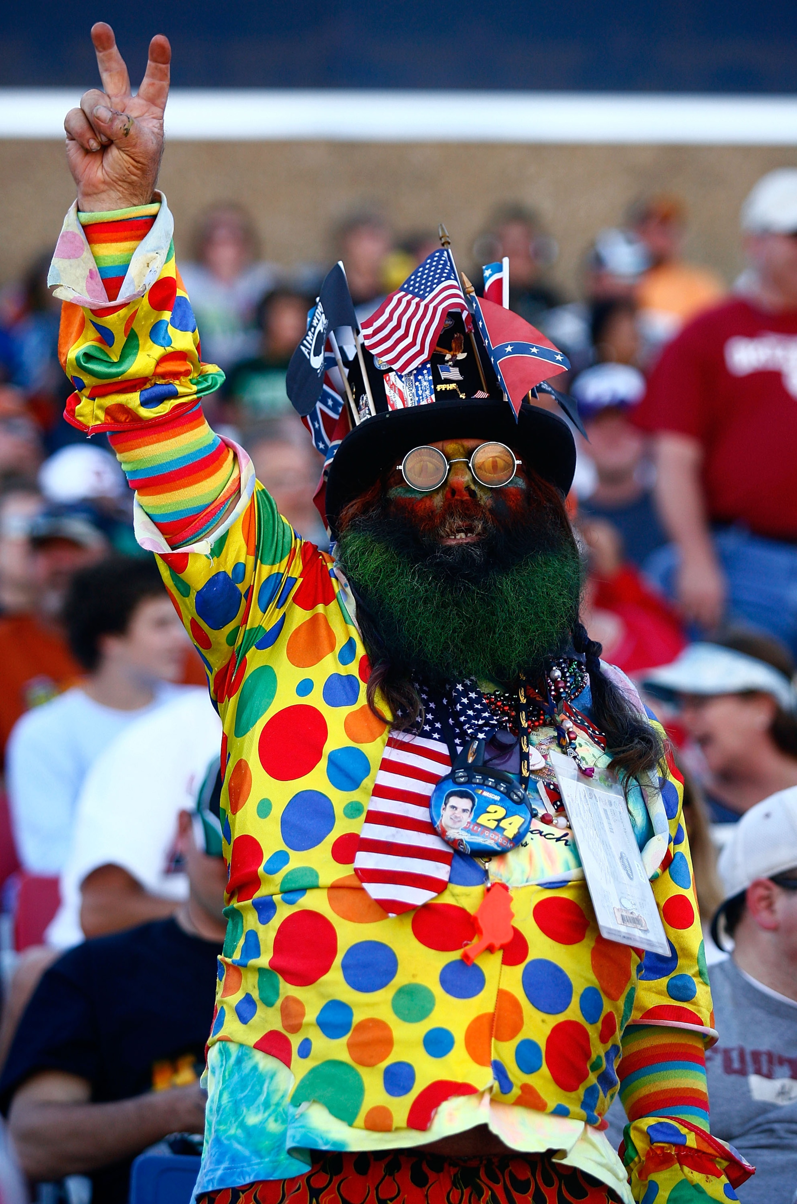 TALLADEGA, AL - OCTOBER 31:  A Fan cheers during the NASCAR Sprint Cup Series AMP Energy Juice 500 at Talladega Superspeedway on October 31, 2010 in Talladega, Alabama.  (Photo by Jason Smith/Getty Images for NASCAR)