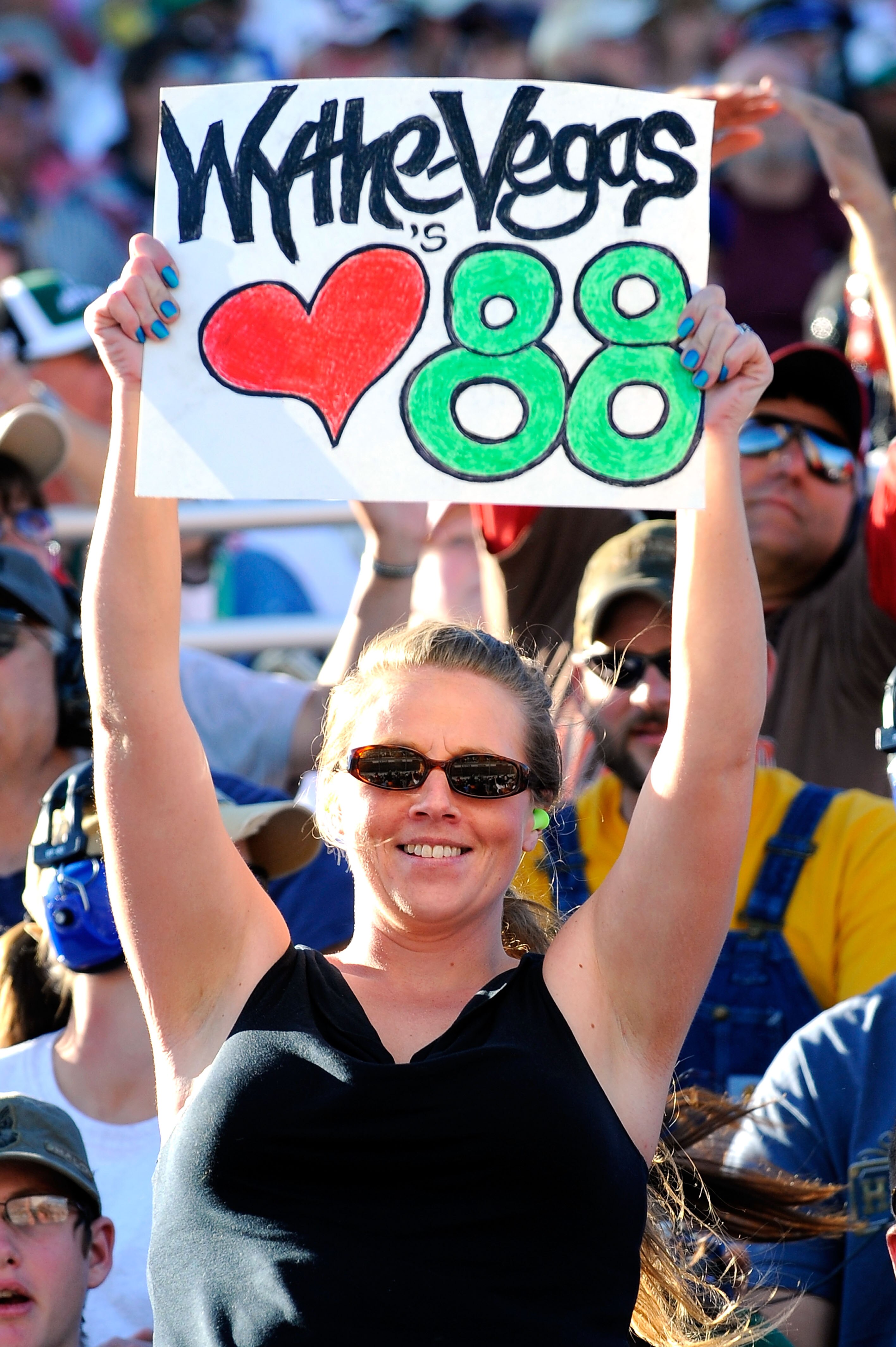 MARTINSVILLE, VA - OCTOBER 24:  Fans cheer during the NASCAR Sprint Cup Series TUMS Fast Relief 500 at Martinsville Speedway on October 24, 2010 in Martinsville, Virginia.  (Photo by Jared C. Tilton/Getty Images for NASCAR)