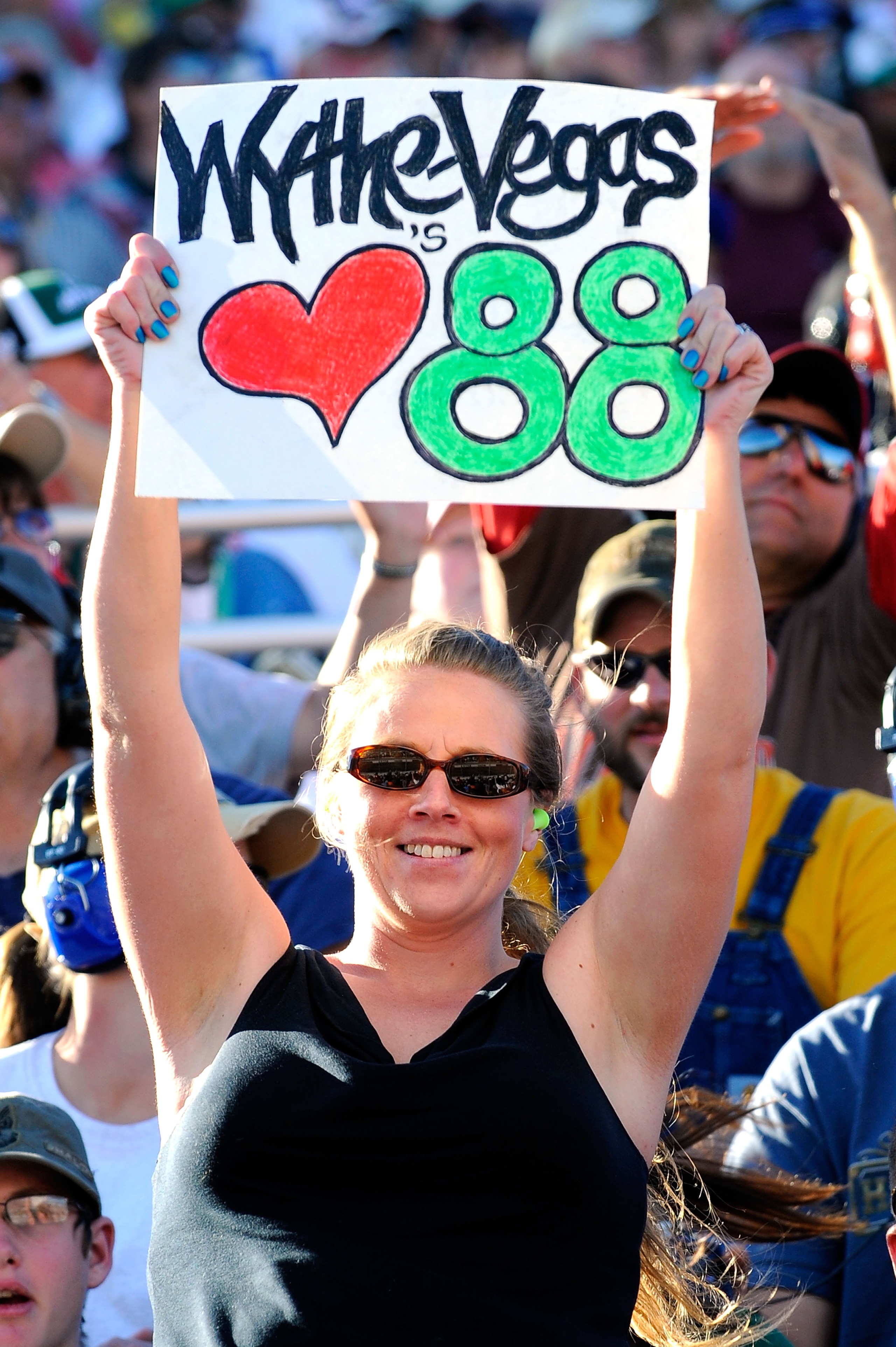 MARTINSVILLE, VA - OCTOBER 24:  Fans cheer during the NASCAR Sprint Cup Series TUMS Fast Relief 500 at Martinsville Speedway on October 24, 2010 in Martinsville, Virginia.  (Photo by Jared C. Tilton/Getty Images for NASCAR)