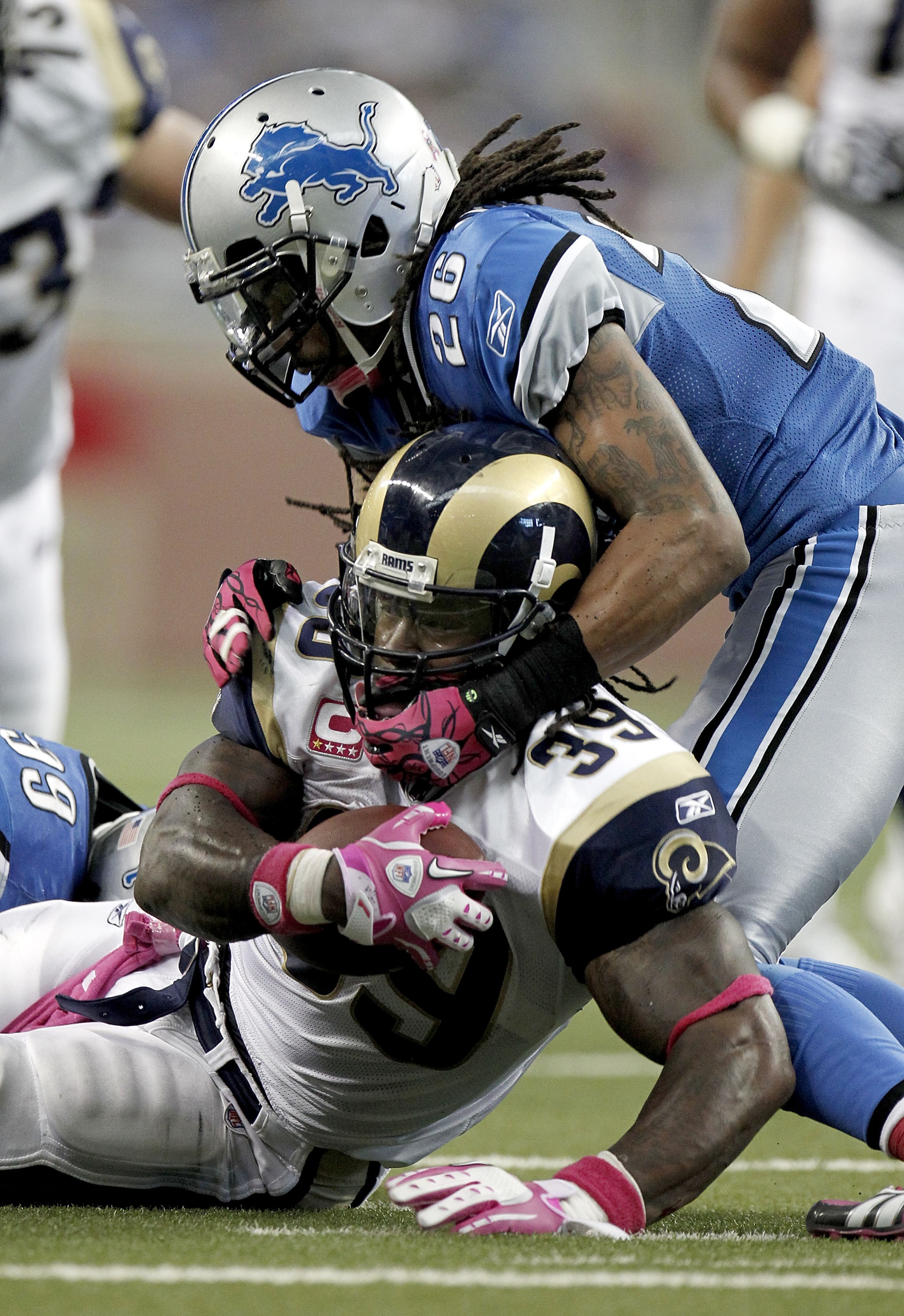 DETROIT - OCTOBER 10: Steven Jackson #39 of the St. Louis Ramsis tackled by Louis Delmas #26 of the Detroit Lions on October 10, 2010 at Ford Field in Detroit, Michigan. Detroit won the game 44-6. (Photo by Gregory Shamus/Getty Images) DETROIT - OCTOBER 10: Steven Jackson #39 of the St. Louis Ramsis tackled by Louis Delmas #26 of the Detroit Lions on October 10, 2010 at Ford Field in Detroit, Michigan. Detroit won the game 44-6. (Photo by Gregory Shamus/Getty Images)
