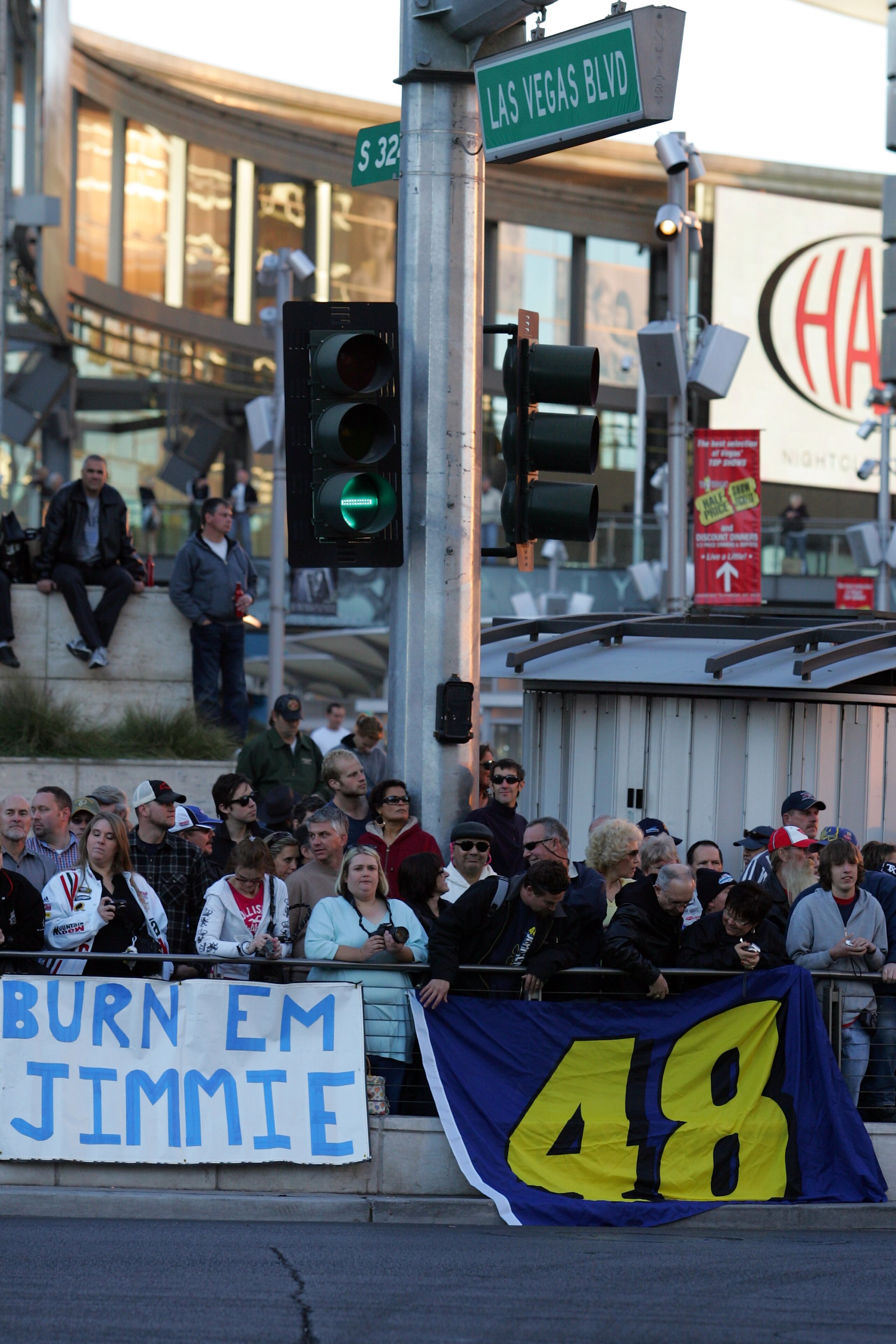 LAS VEGAS - DECEMBER 03:  Jimmie Johnson Fans watch the Victory Lap of the NASCAR Sprint Cup Series Champions Week on December 3, 2009 in Las Vegas, Nevada.  (Photo by Todd Warshaw/Getty Images for NASCAR)