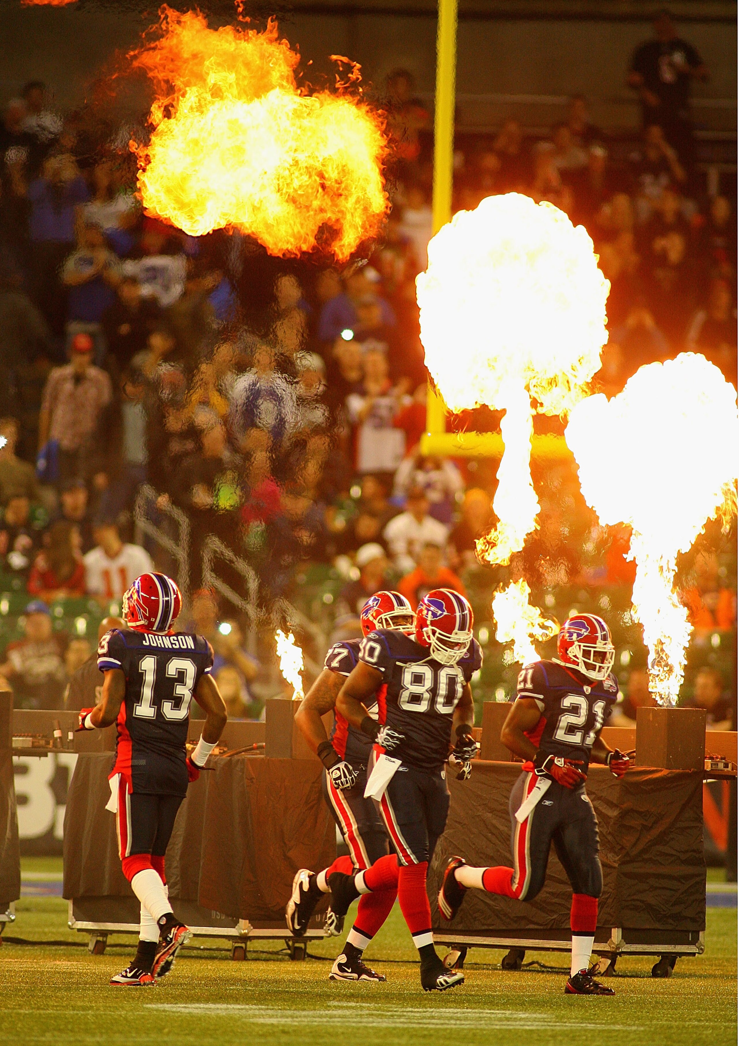 TORONTO, ON - NOVEMBER 07: Steve Johnson #13, David Martin #80, and CJ Spiller #21 of the Buffalo Bills take the field prior to playing the Chicago Bears at Rogers Centre on November 7, 2010 in Toronto, Canada.  (Photo by Rick Stewart/Getty Images)