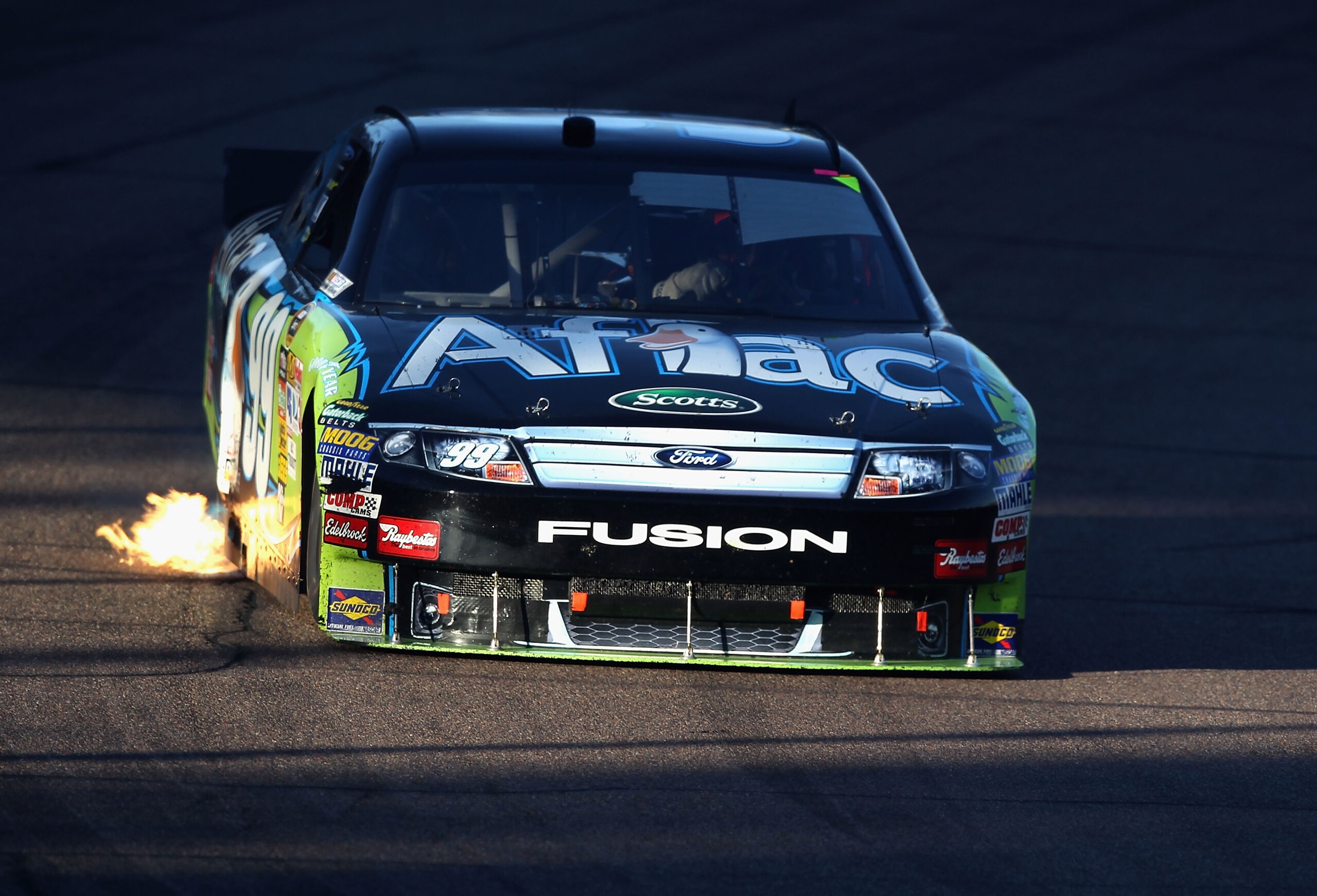 AVONDALE, AZ - NOVEMBER 14: Carl Edwards, driver of the #99 Aflac Ford, drives during the NASCAR Sprint Cup Series Kobalt Tools 500 at Phoenix International Raceway on November 14, 2010 in Avondale, Arizona. (Photo by Christian Petersen/Getty Images for AVONDALE, AZ - NOVEMBER 14: Carl Edwards, driver of the #99 Aflac Ford, drives during the NASCAR Sprint Cup Series Kobalt Tools 500 at Phoenix International Raceway on November 14, 2010 in Avondale, Arizona. (Photo by Christian Petersen/Getty Images for