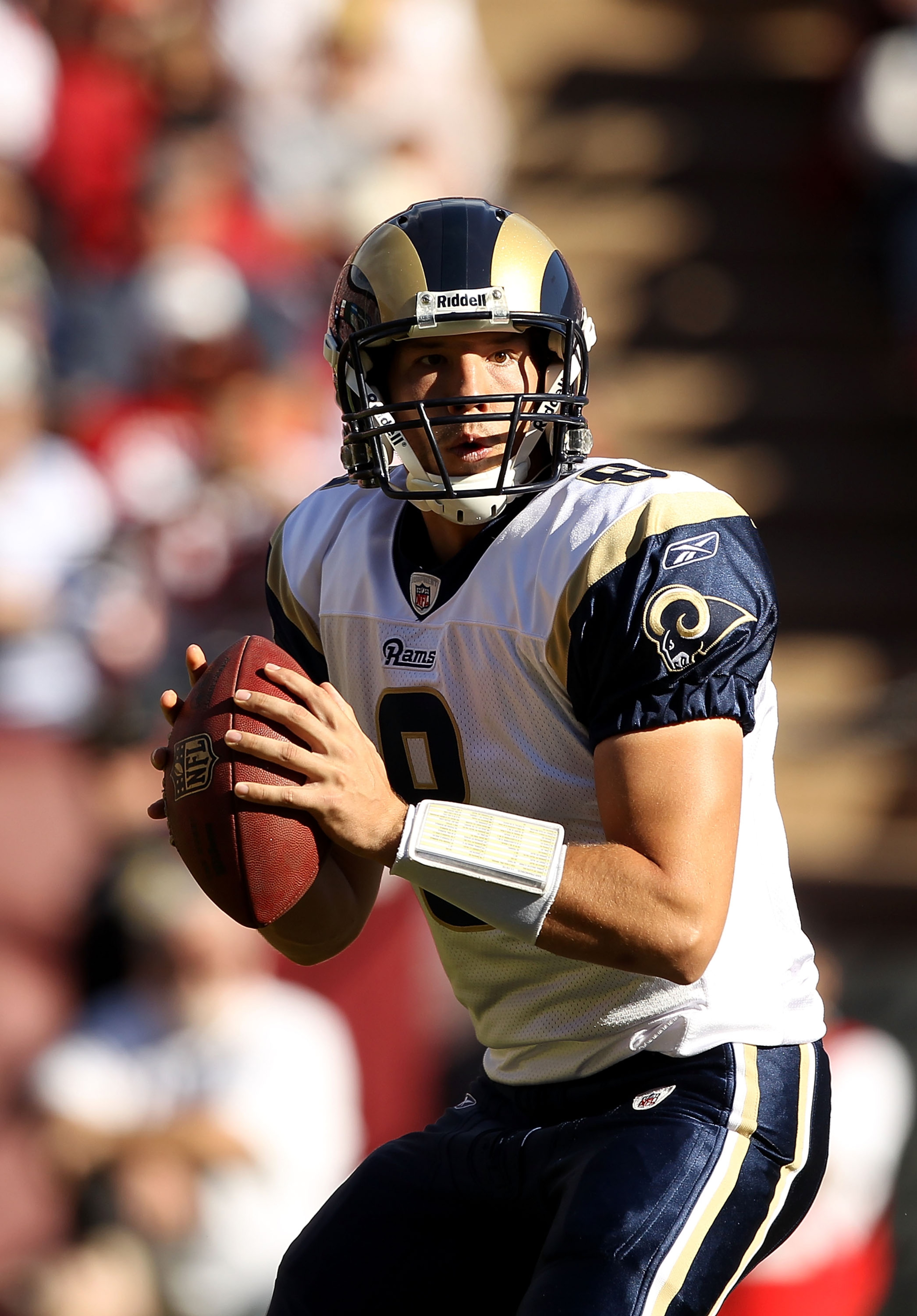 SAN FRANCISCO - NOVEMBER 14:  Sam Bradford #8 of the St. Louis Rams looks to pass the ball against the San Francisco 49ers at Candlestick Park on November 14, 2010 in San Francisco, California.  (Photo by Ezra Shaw/Getty Images)