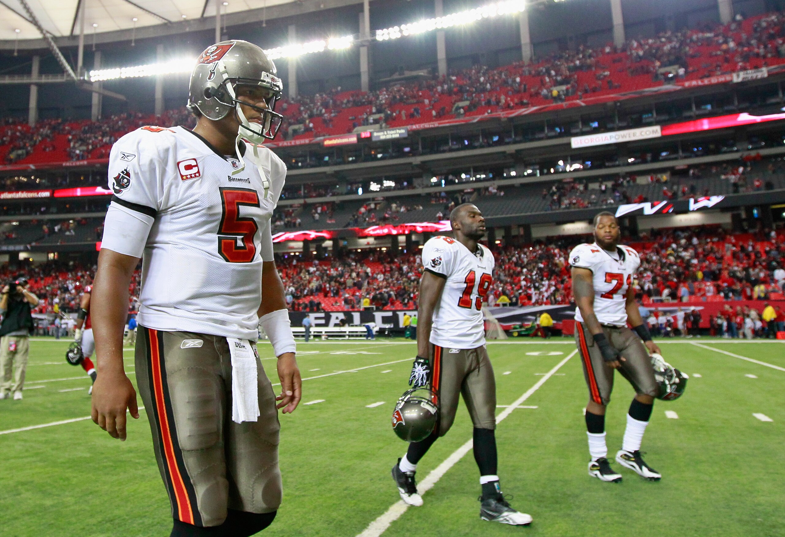 ATLANTA - NOVEMBER 07:  Quarterback Josh Freeman #5 of the Tampa Bay Buccaneers walks off the field after their 27-21 loss to the Atlanta Falcons at Georgia Dome on November 7, 2010 in Atlanta, Georgia.  (Photo by Kevin C. Cox/Getty Images)