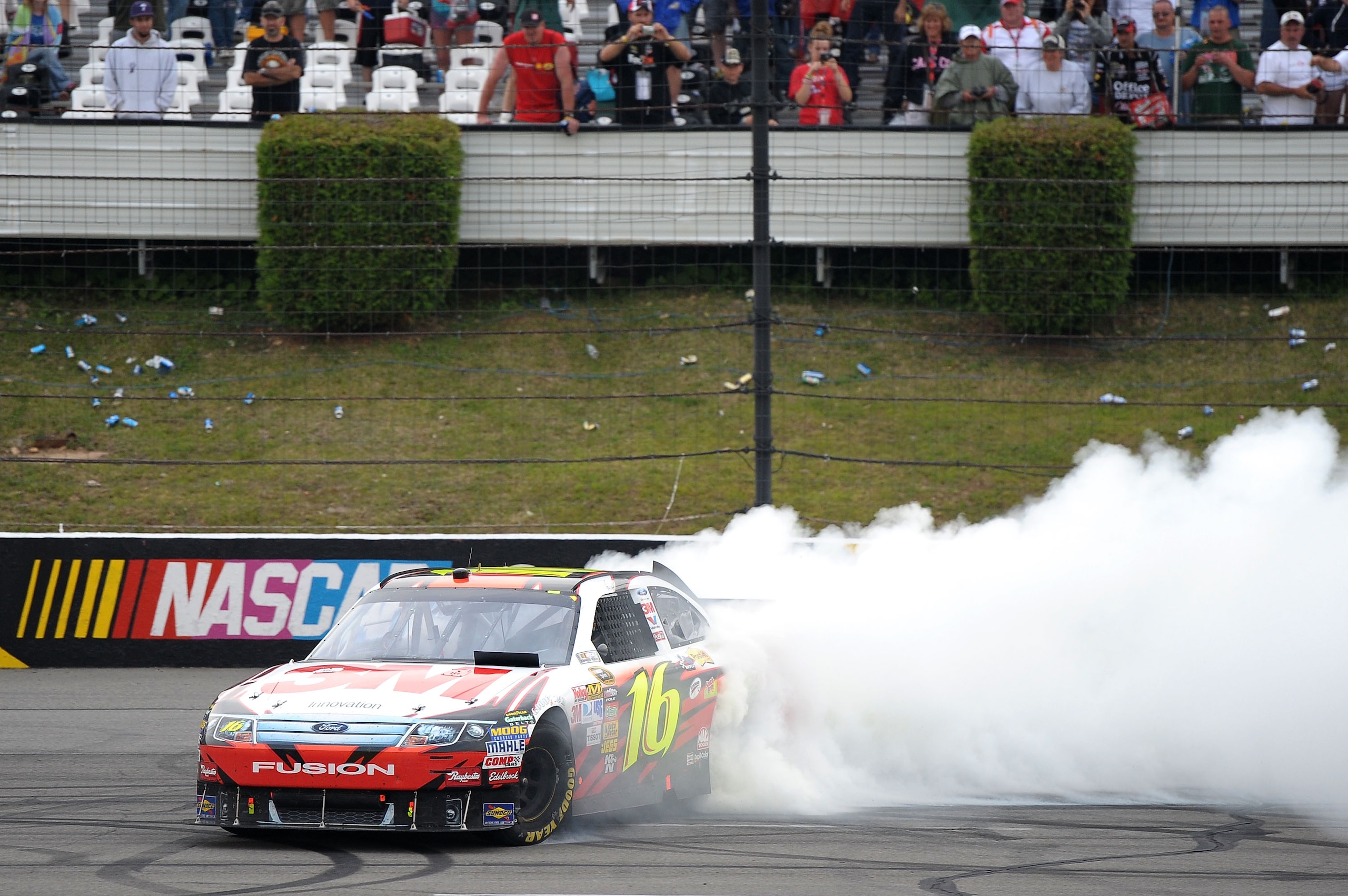 LONG POND, PA - AUGUST 01: Greg Biffle, driver of the #16 3M Ford, performs a burnout after winning the NASCAR Sprint Cup Series Sunoco Red Cross Pennsylvania 500 at Pocono Raceway on August 1, 2010 in Long Pond, Pennsylvania. (Photo by Drew Hallowell/G LONG POND, PA - AUGUST 01: Greg Biffle, driver of the #16 3M Ford, performs a burnout after winning the NASCAR Sprint Cup Series Sunoco Red Cross Pennsylvania 500 at Pocono Raceway on August 1, 2010 in Long Pond, Pennsylvania. (Photo by Drew Hallowell/G