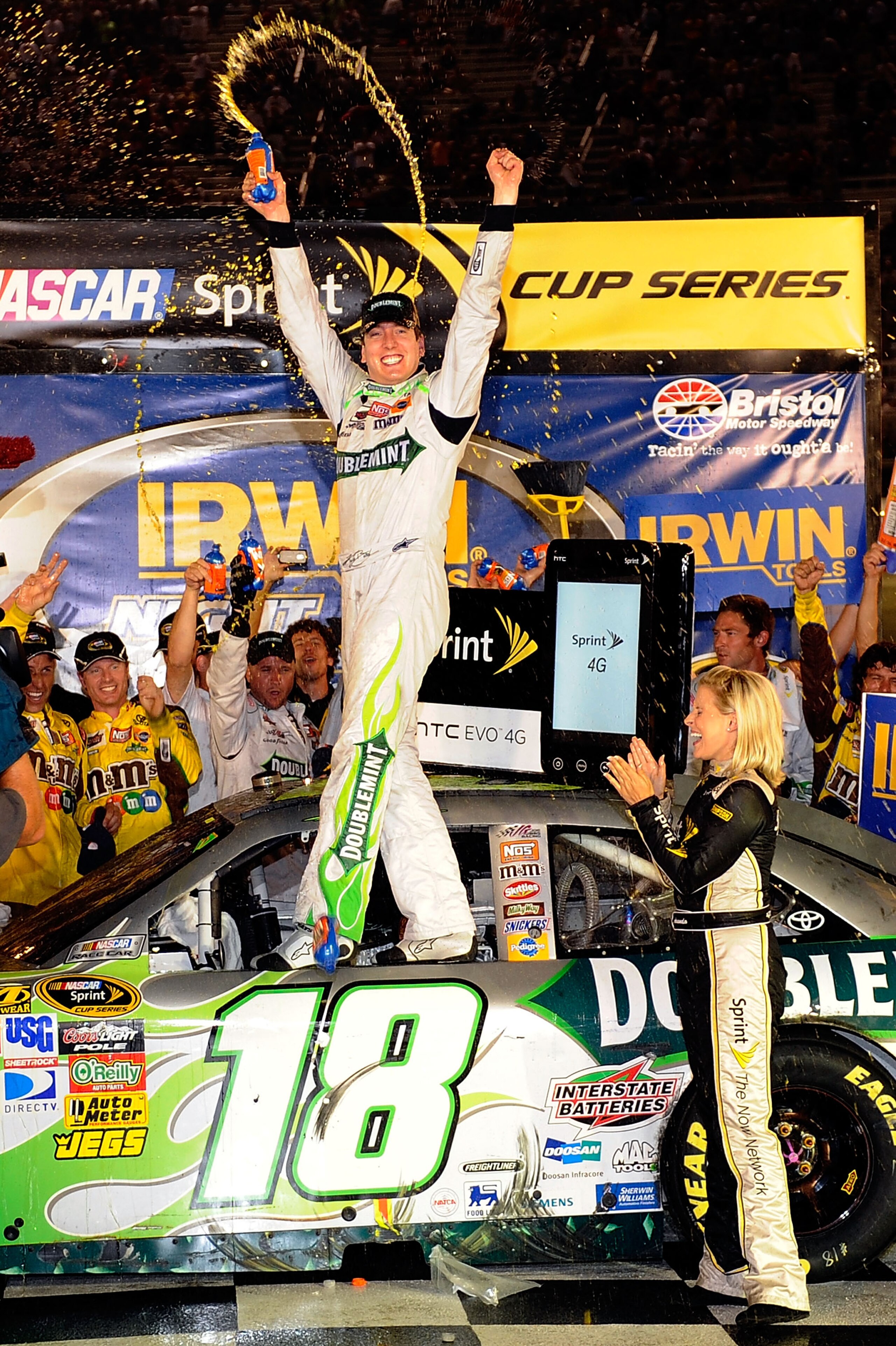 BRISTOL, TN - AUGUST 21: Kyle Busch, driver of the #18 Doublemint Toyota, celebrates in Victory Lane after winning the NASCAR Sprint Cup Series IRWIN Tools Night Race at Bristol Motor Speedway on August 21, 2010 in Bristol, Tennessee. (Photo by John Har BRISTOL, TN - AUGUST 21: Kyle Busch, driver of the #18 Doublemint Toyota, celebrates in Victory Lane after winning the NASCAR Sprint Cup Series IRWIN Tools Night Race at Bristol Motor Speedway on August 21, 2010 in Bristol, Tennessee. (Photo by John Har