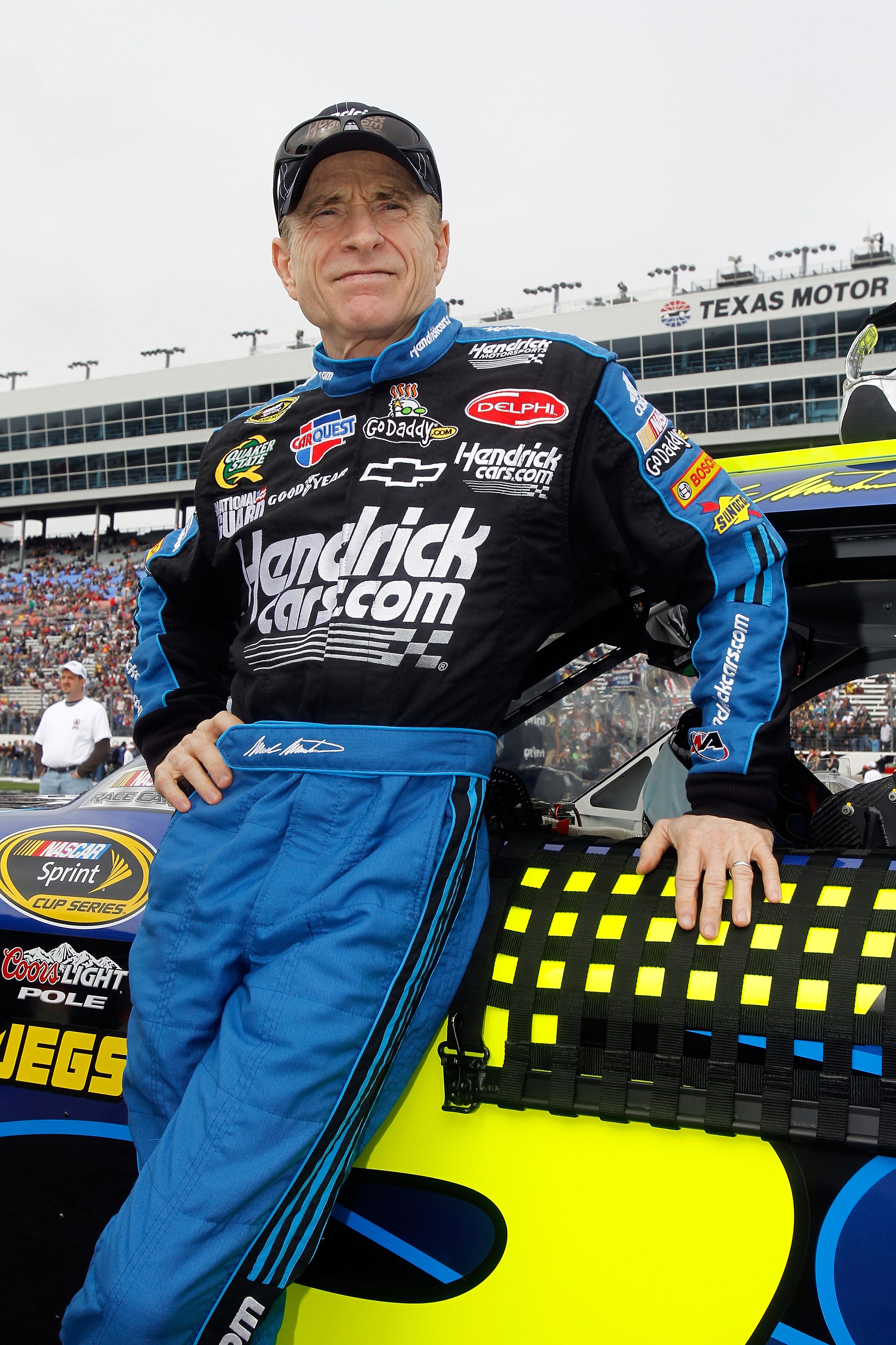 FORT WORTH, TX - APRIL 19: Mark Martin, driver of the #5 Hendricks.com/GoDaddy.com Chevrolet, looks on prior to the start of the NASCAR Sprint Cup Series Samsung Mobile 500 at Texas Motor Speedway on April 19, 2010 in Fort Worth, Texas. (Photo by Todd W FORT WORTH, TX - APRIL 19: Mark Martin, driver of the #5 Hendricks.com/GoDaddy.com Chevrolet, looks on prior to the start of the NASCAR Sprint Cup Series Samsung Mobile 500 at Texas Motor Speedway on April 19, 2010 in Fort Worth, Texas. (Photo by Todd W