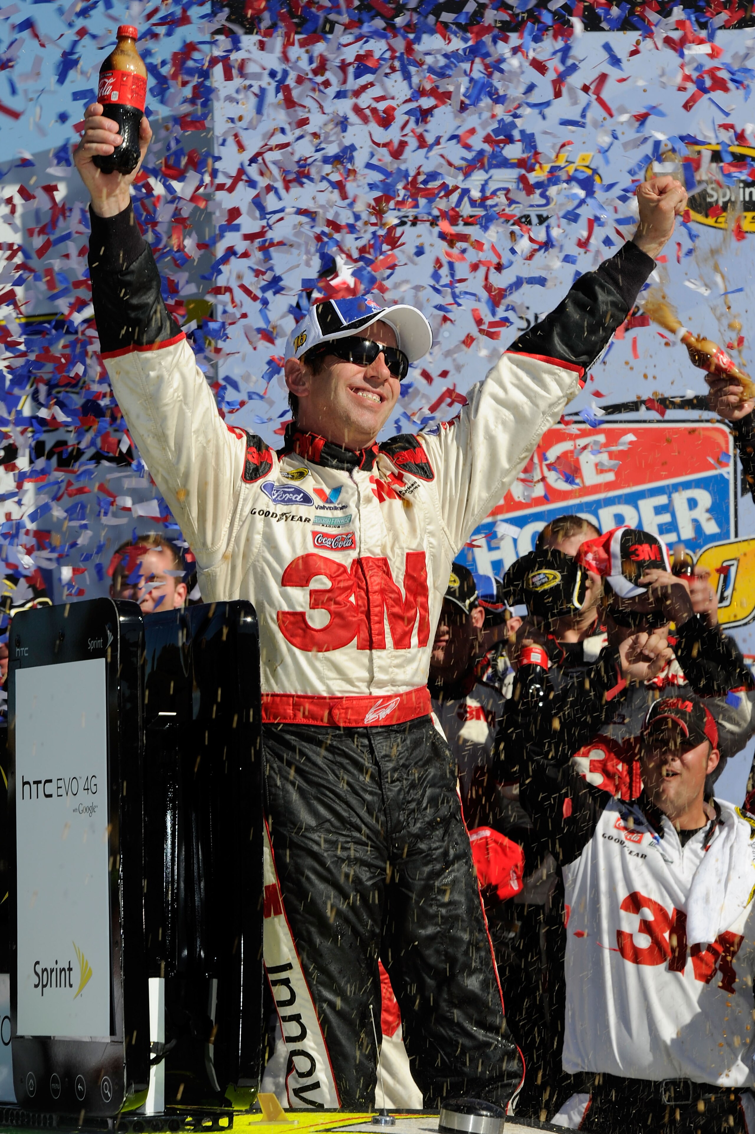 KANSAS CITY, KS - OCTOBER 03: Greg Biffle, driver of the #16 3M Ford, celebrates in victory lane after winning the NASCAR Sprint Cup Series Price Chopper 400 on October 3, 2010 in Kansas City, Kansas. (Photo by John Harrelson/Getty Images for NASCAR) KANSAS CITY, KS - OCTOBER 03: Greg Biffle, driver of the #16 3M Ford, celebrates in victory lane after winning the NASCAR Sprint Cup Series Price Chopper 400 on October 3, 2010 in Kansas City, Kansas. (Photo by John Harrelson/Getty Images for NASCAR)