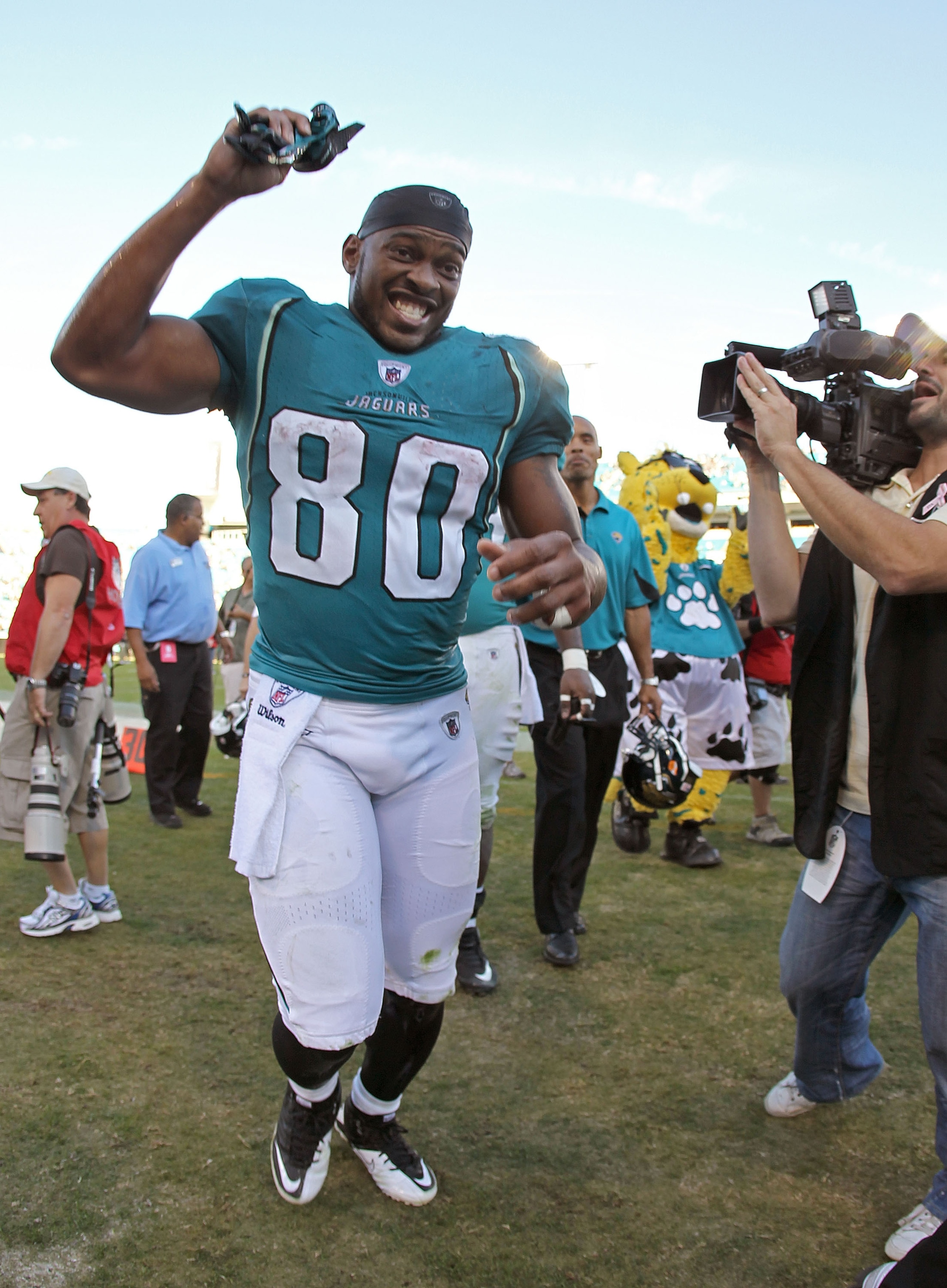 JACKSONVILLE, FL - NOVEMBER 14: Mike Thomas #80 of the Jacksonville Jaguars walks off the field after winning a game against the Houston Texans at EverBank Field on November 14, 2010 in Jacksonville, Florida.  (Photo by Mike Ehrmann/Getty Images)