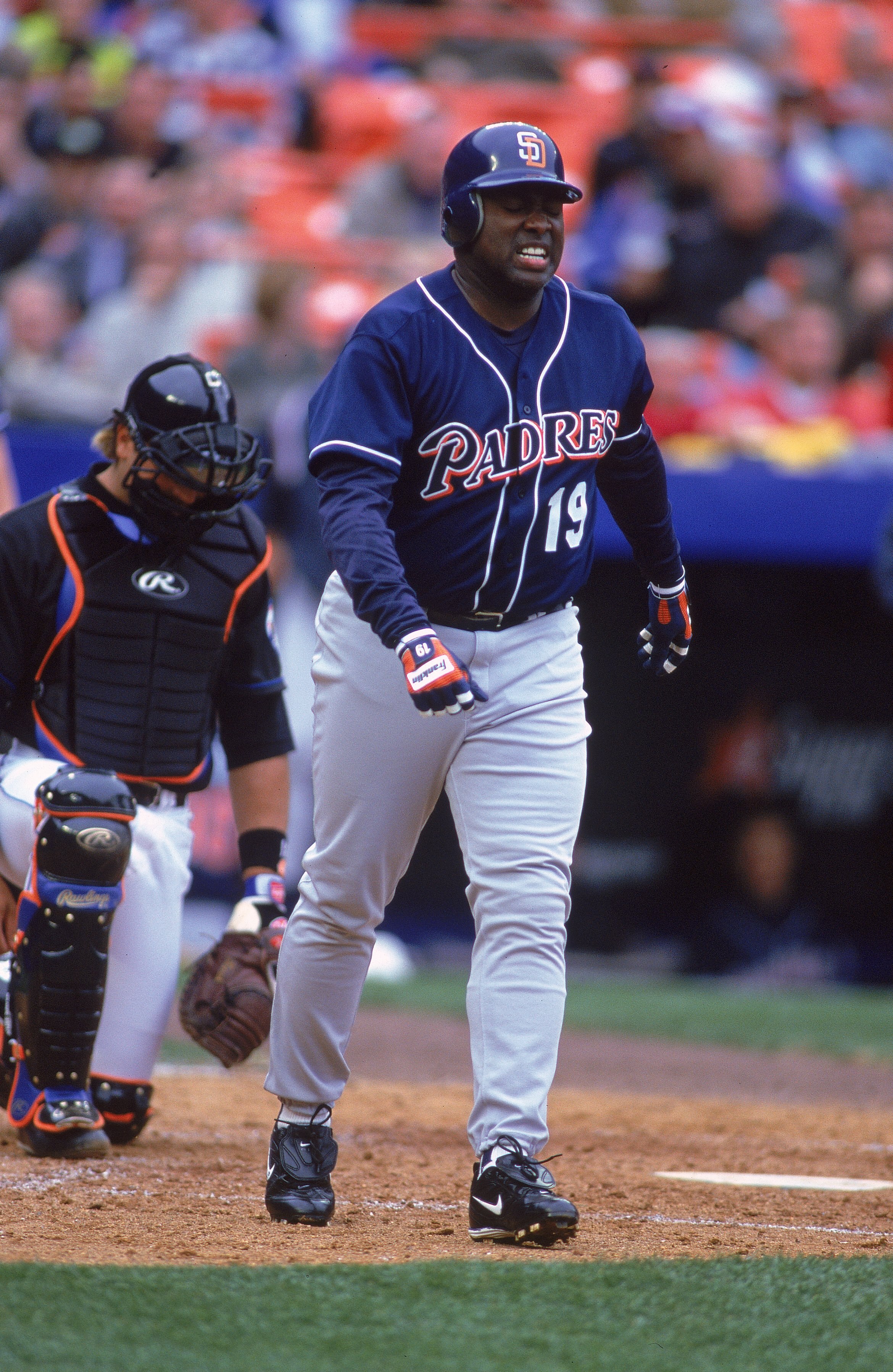 3 Apr 2000:  Tony Gwynn #19 of the San Diego Padres getting off the field after being hit by the pitch during the game against the New York Mets at Shea Stadium in Flushing, New York. The Mets defeated the Padres 2-1. Mandatory Credit: Al Bello  /Allsport