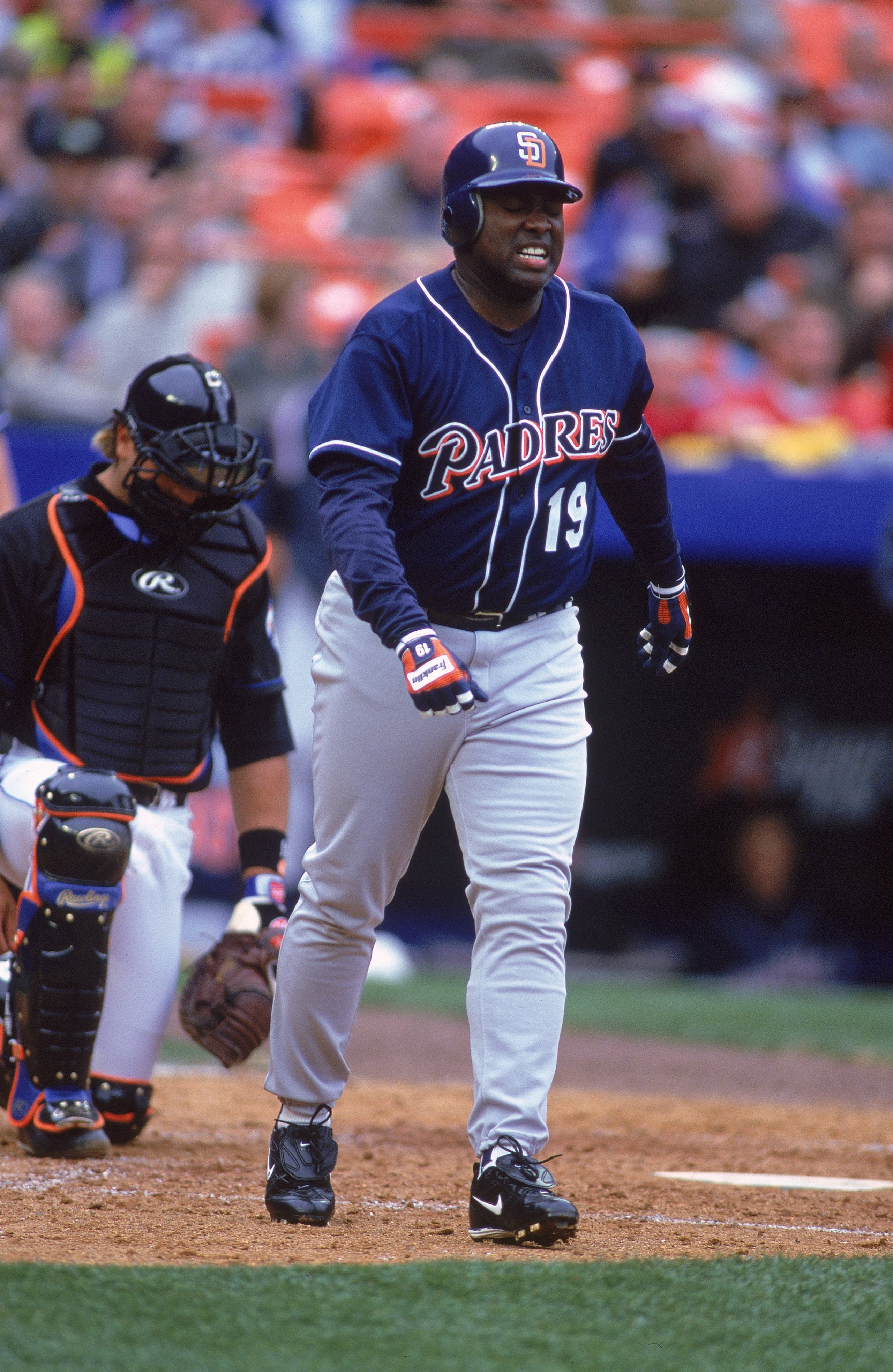 3 Apr 2000:  Tony Gwynn #19 of the San Diego Padres getting off the field after being hit by the pitch during the game against the New York Mets at Shea Stadium in Flushing, New York. The Mets defeated the Padres 2-1. Mandatory Credit: Al Bello  /Allsport