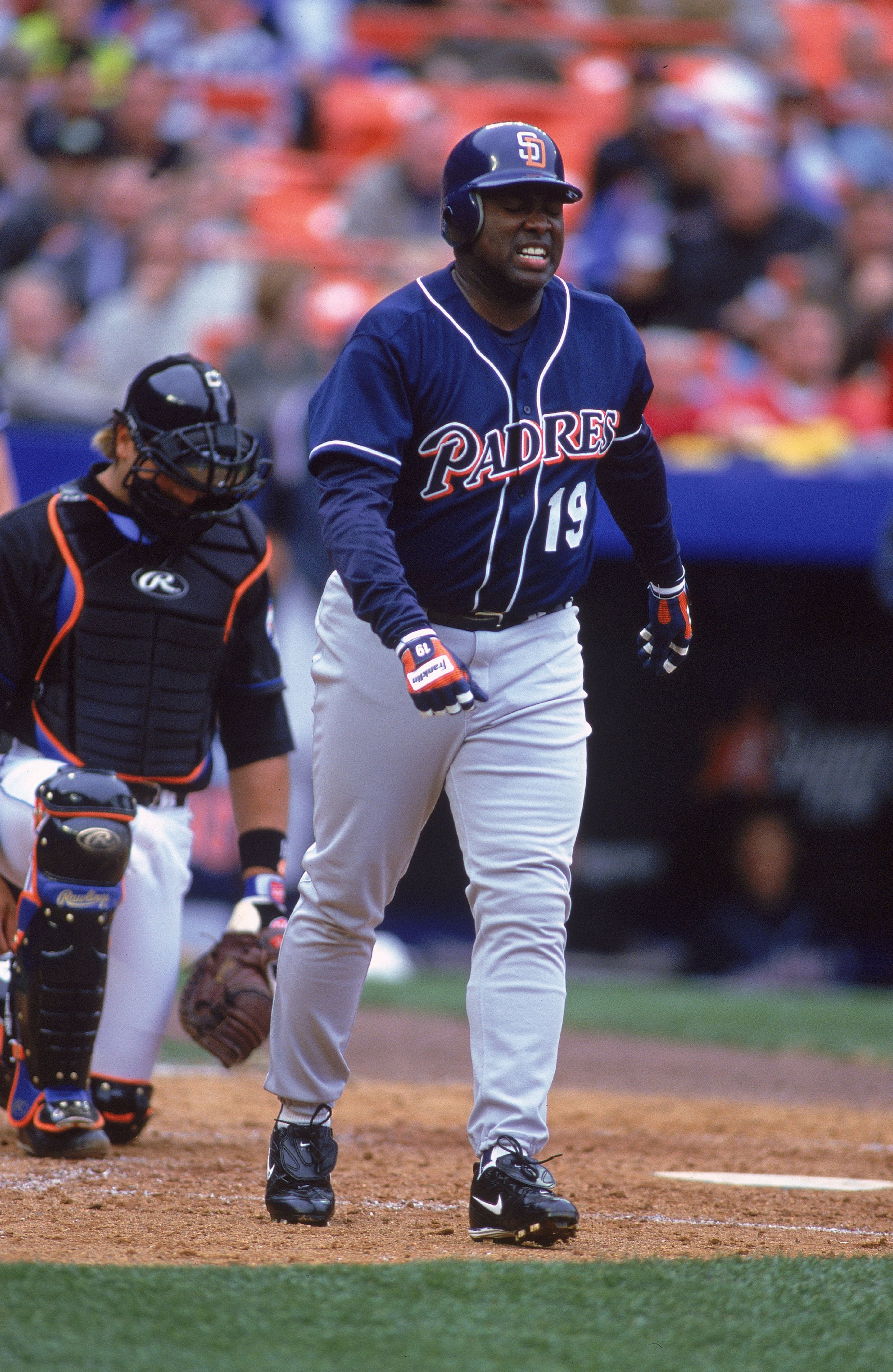 3 Apr 2000:  Tony Gwynn #19 of the San Diego Padres getting off the field after being hit by the pitch during the game against the New York Mets at Shea Stadium in Flushing, New York. The Mets defeated the Padres 2-1. Mandatory Credit: Al Bello  /Allsport