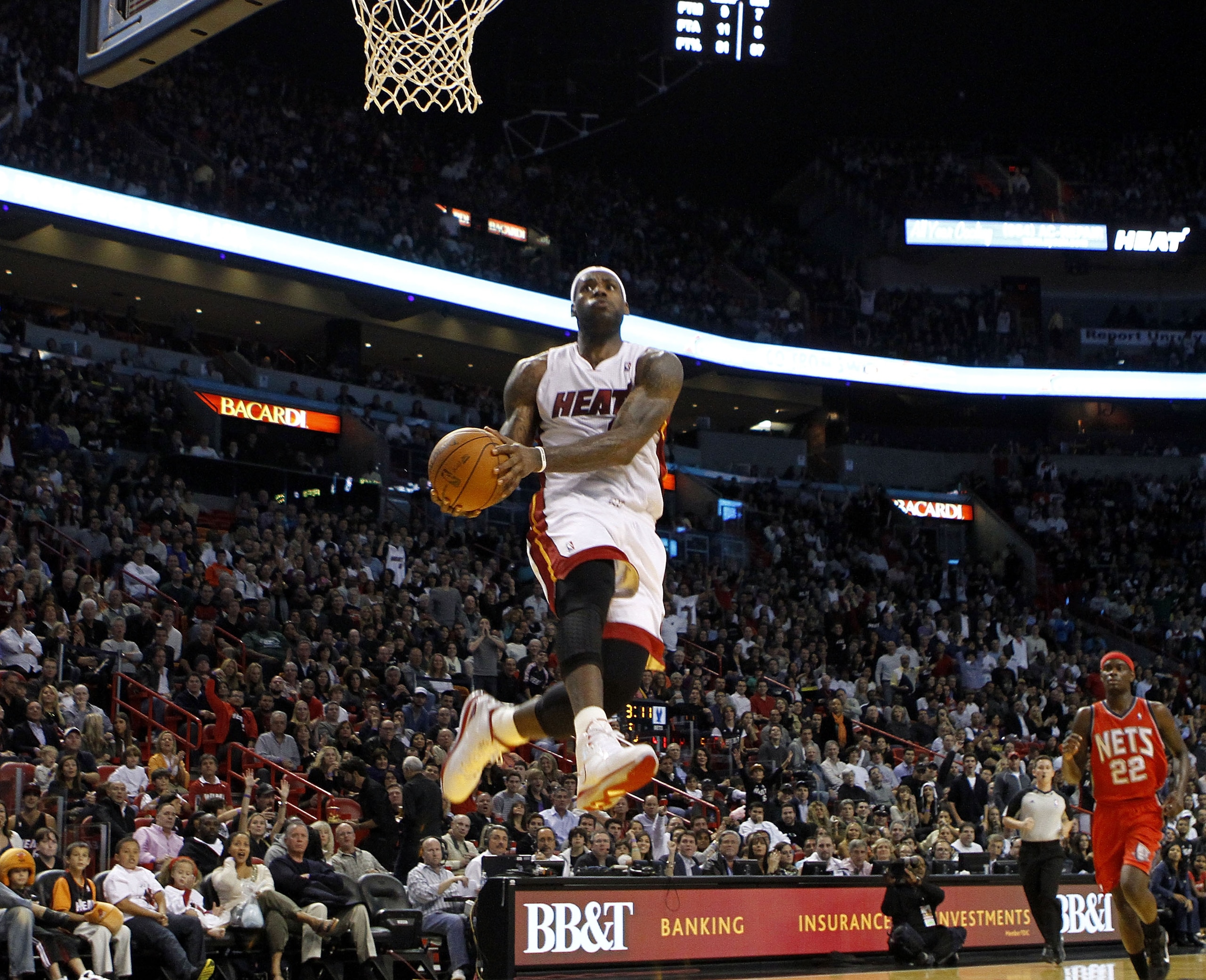 MIAMI - NOVEMBER 06: Forward LeBron James #6  of the Miami Heat dunks against the New Jersey Nets  at American Airlines Arena on November 6, 2010 in Miami, Florida. NOTE TO USER: User expressly acknowledges and agrees that, by downloading and or using thi
